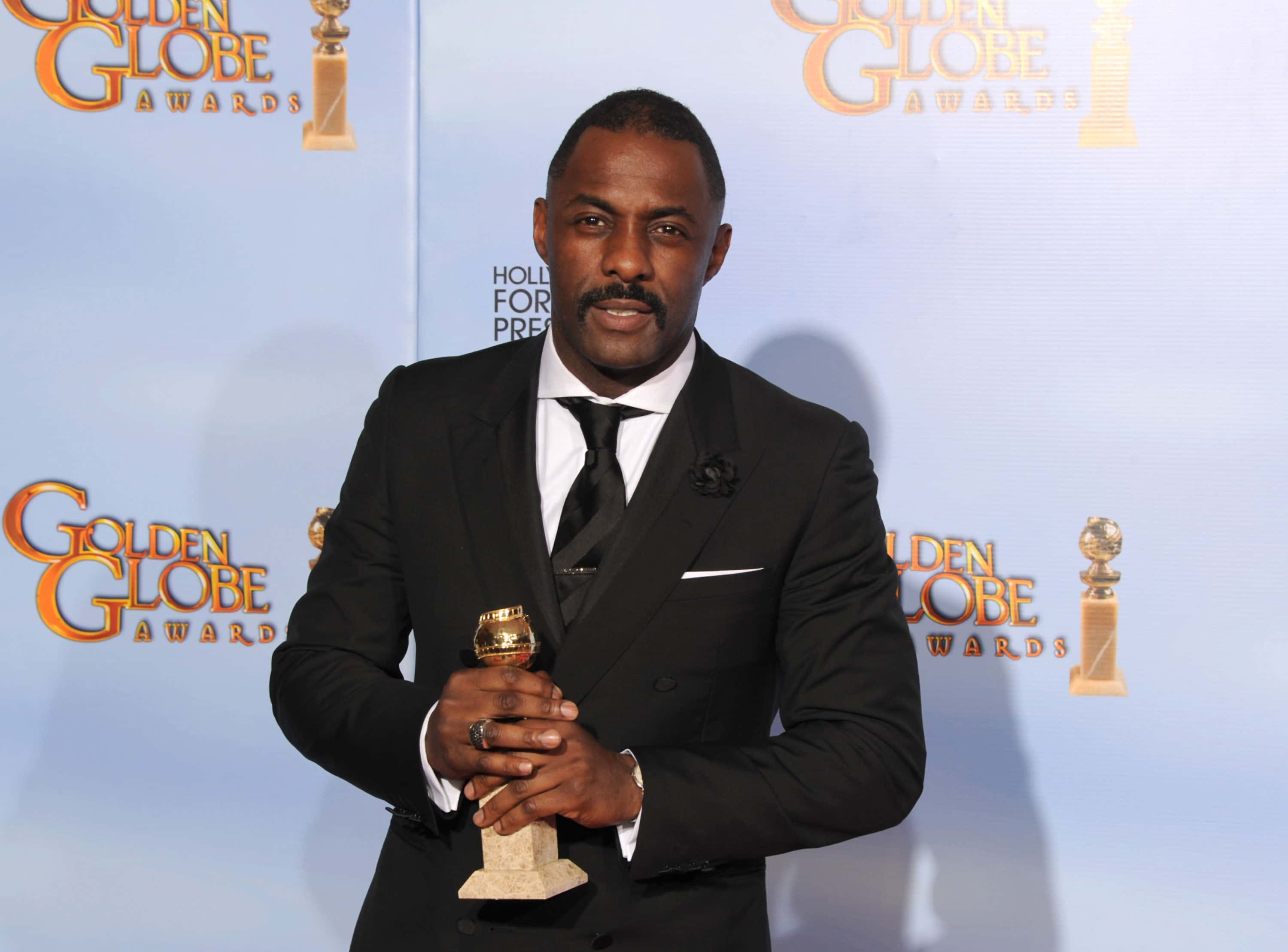 Actor Idris Elba poses in the press room with the Best Performance