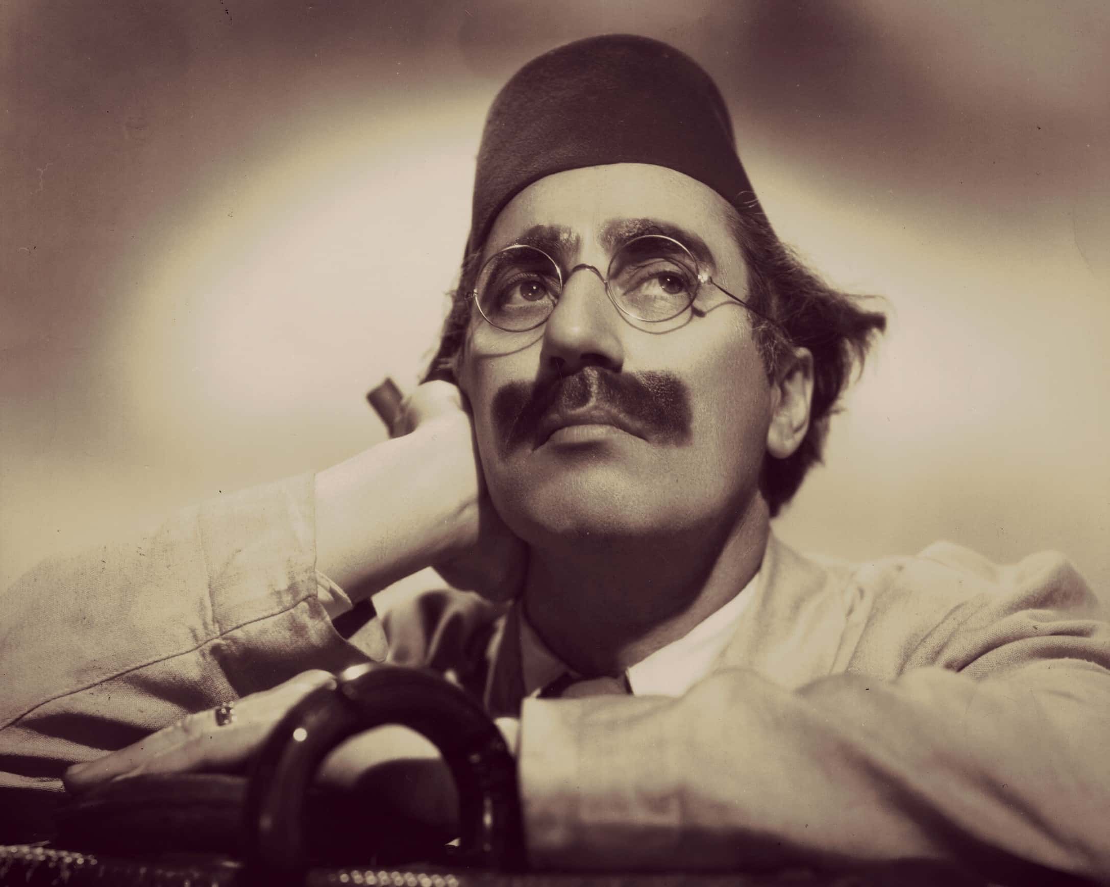 Julius 'Groucho' Marx wearing a fez for his role in 'A Night In Casablanca'