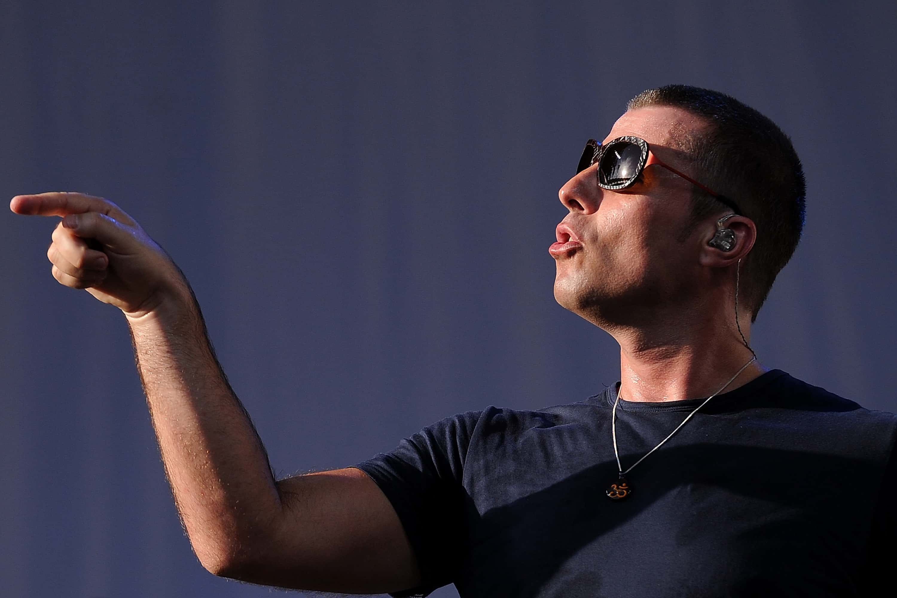 Liam Gallagher of Beady Eye performs live for fans