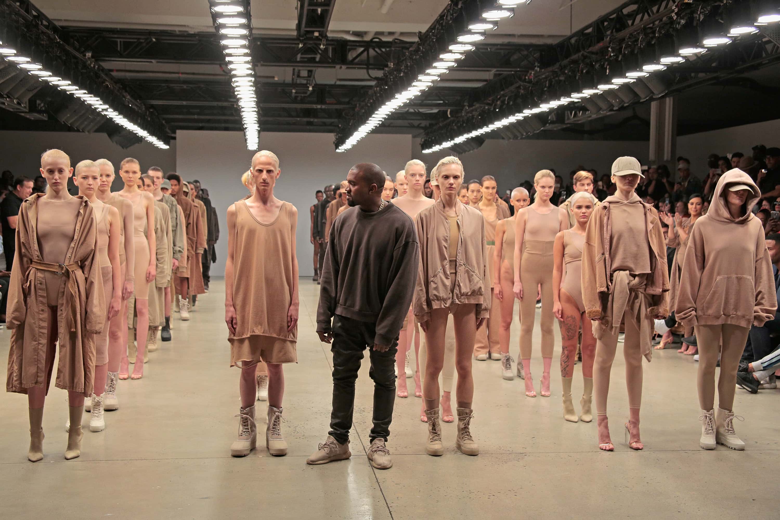 Kanye West poses during the finale of Yeezy Season 2