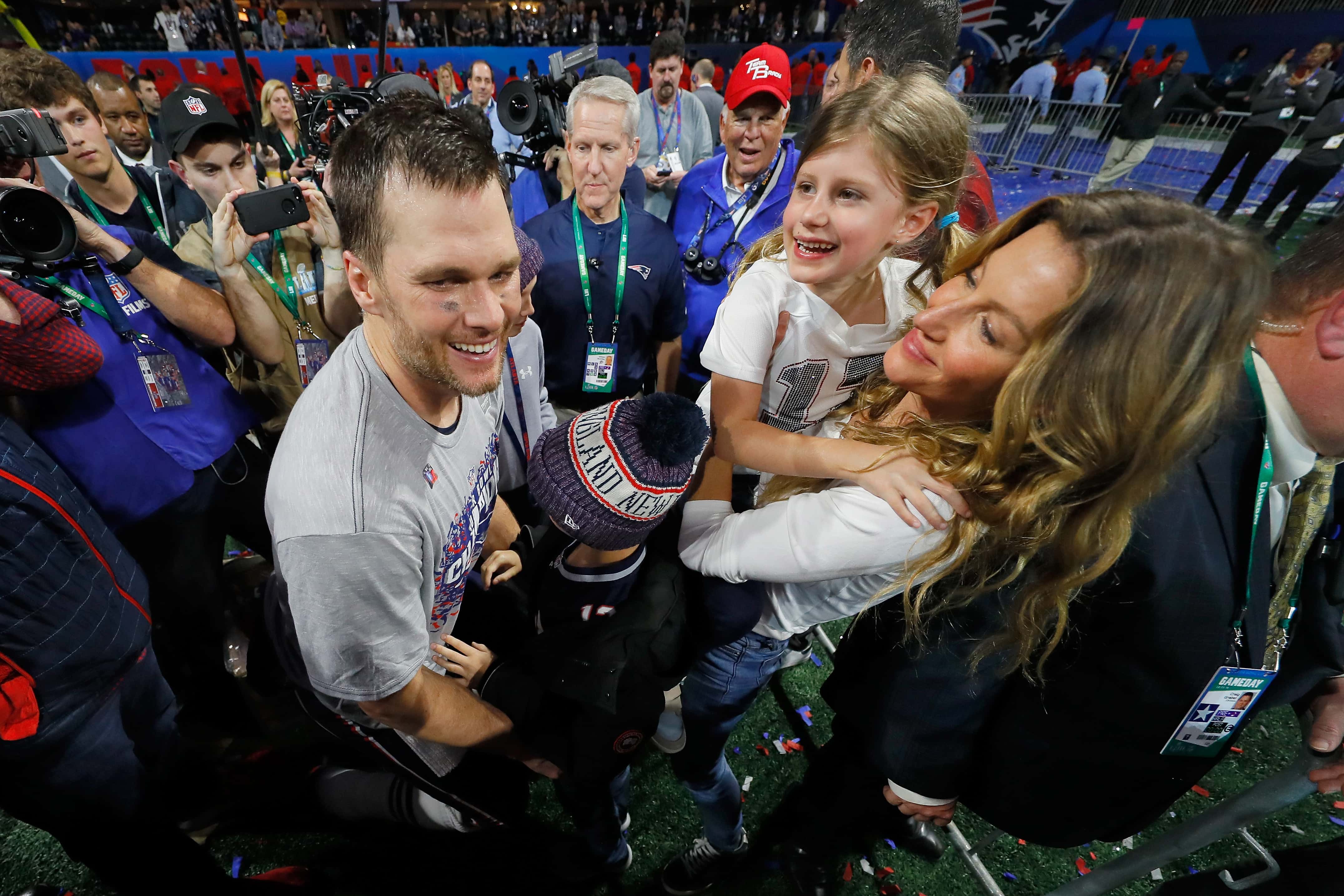 Tom Brady #12 of the New England Patriots celebrates with wife Gisele Bundchen and children Vivian and Benjamin 