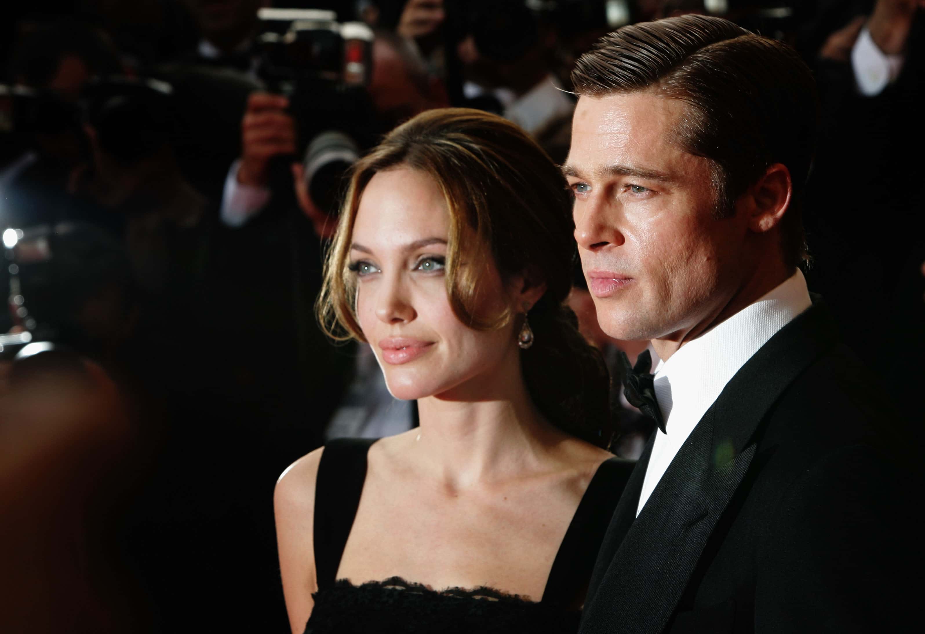 Actors Brad Pitt and Angelina Jolie attend the premiere for the film 