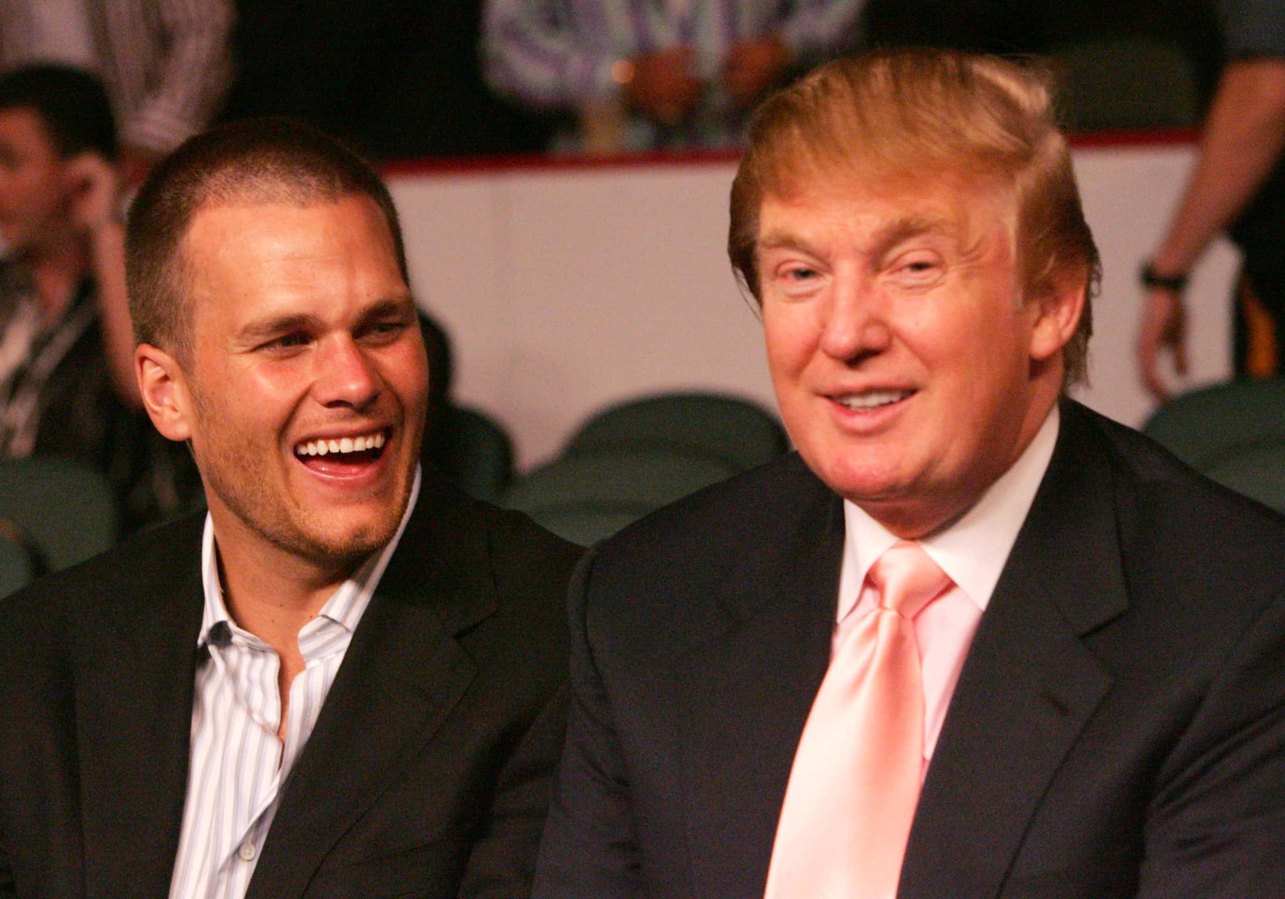 New England Patriots quarterback Tom Brady chats with Donald Trump