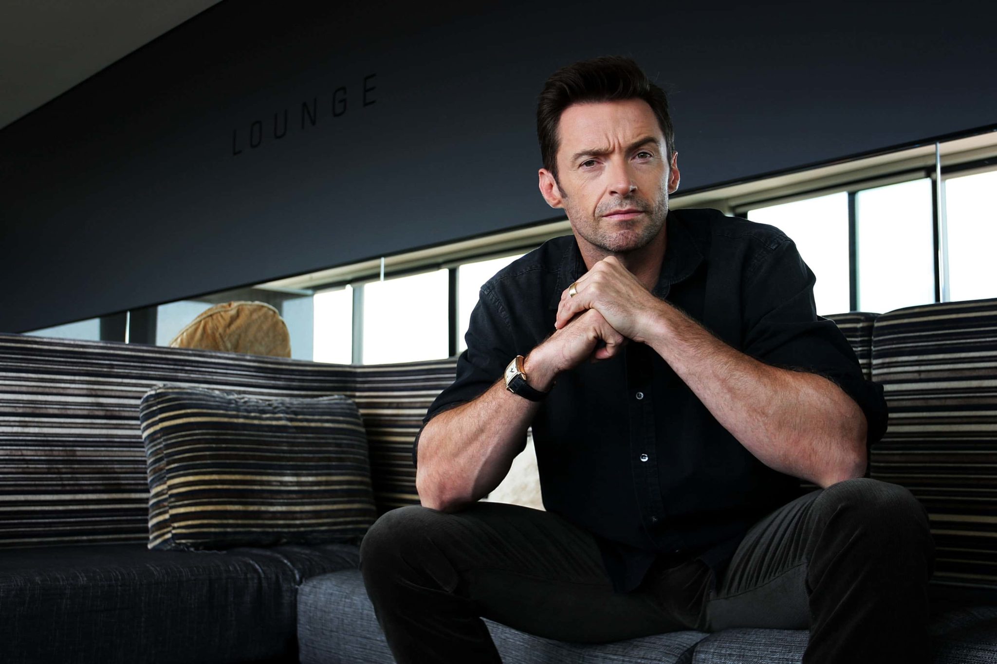 Australian actor Hugh Jackman poses during a photo call to promote his new film Real Steel at the Intercontinental Hotel