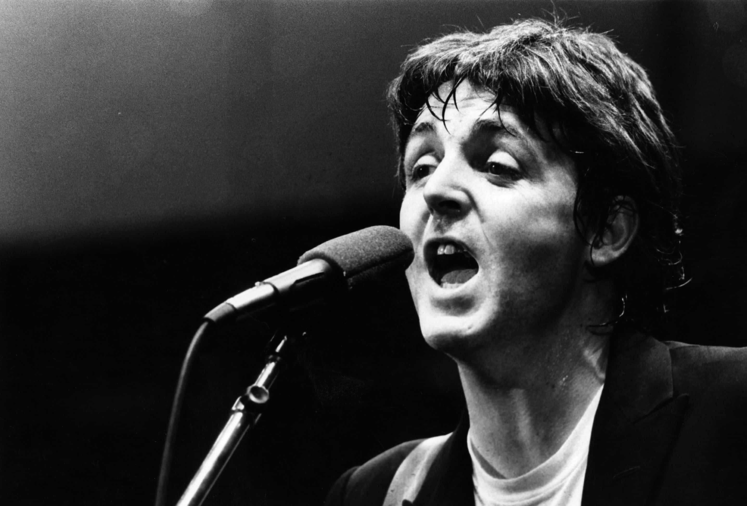 Grayscale Portrait Photo of singer-songwriter Paul McCartney