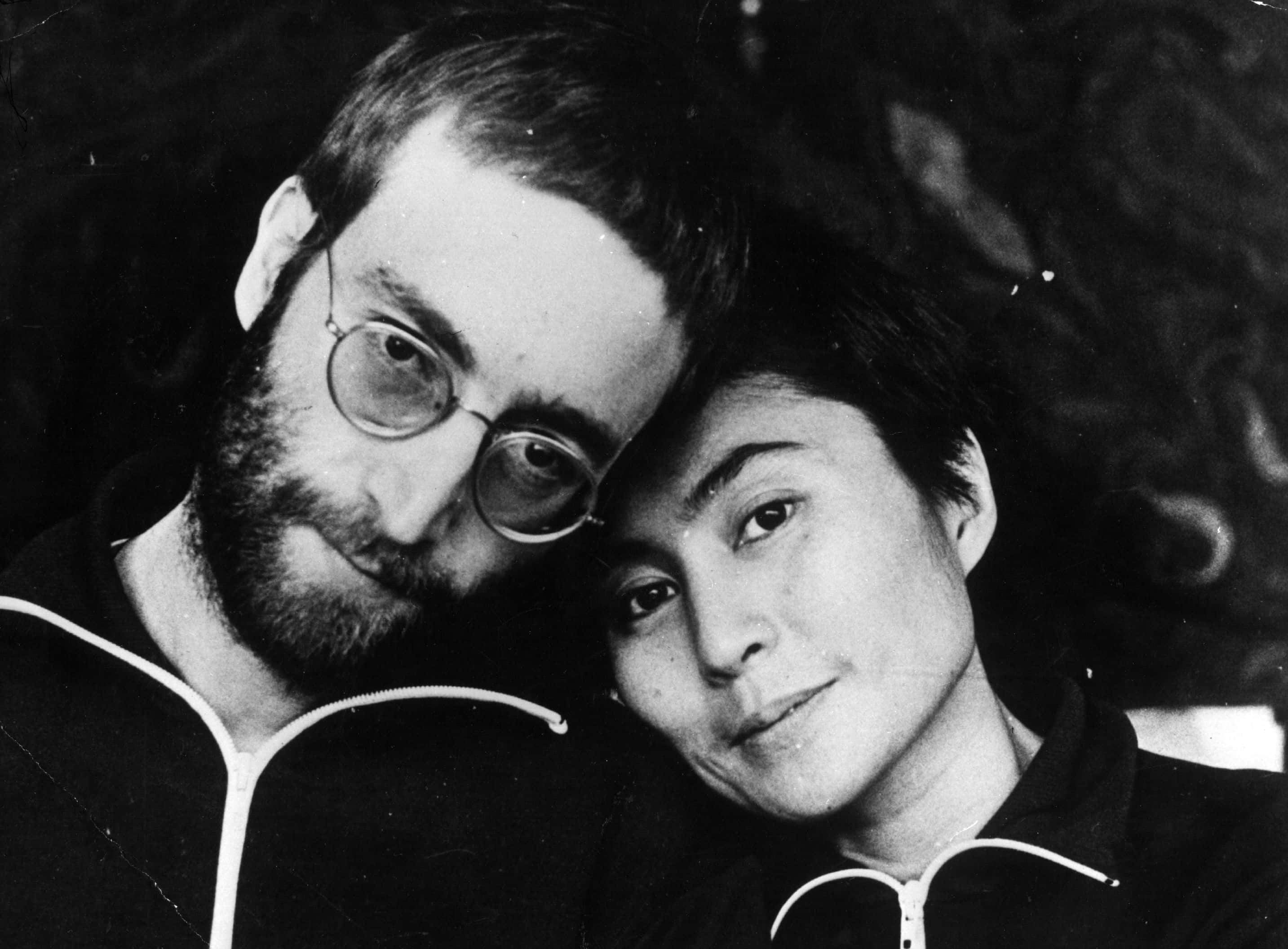 John Lennon (1940 - 1980) with his wife Yoko Ono with short hair