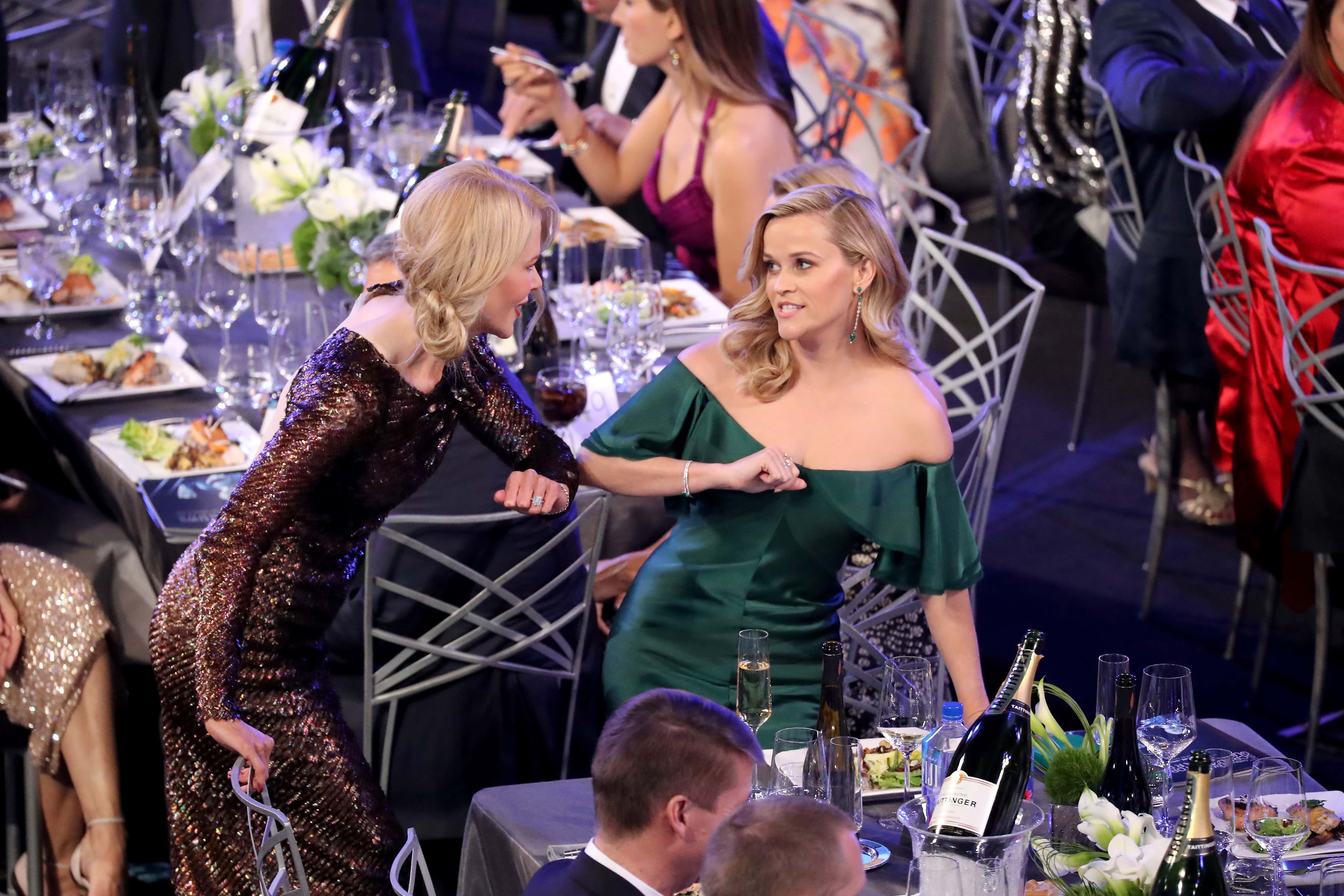Nicole Kidman (L) and Reese Witherspoon at an award show