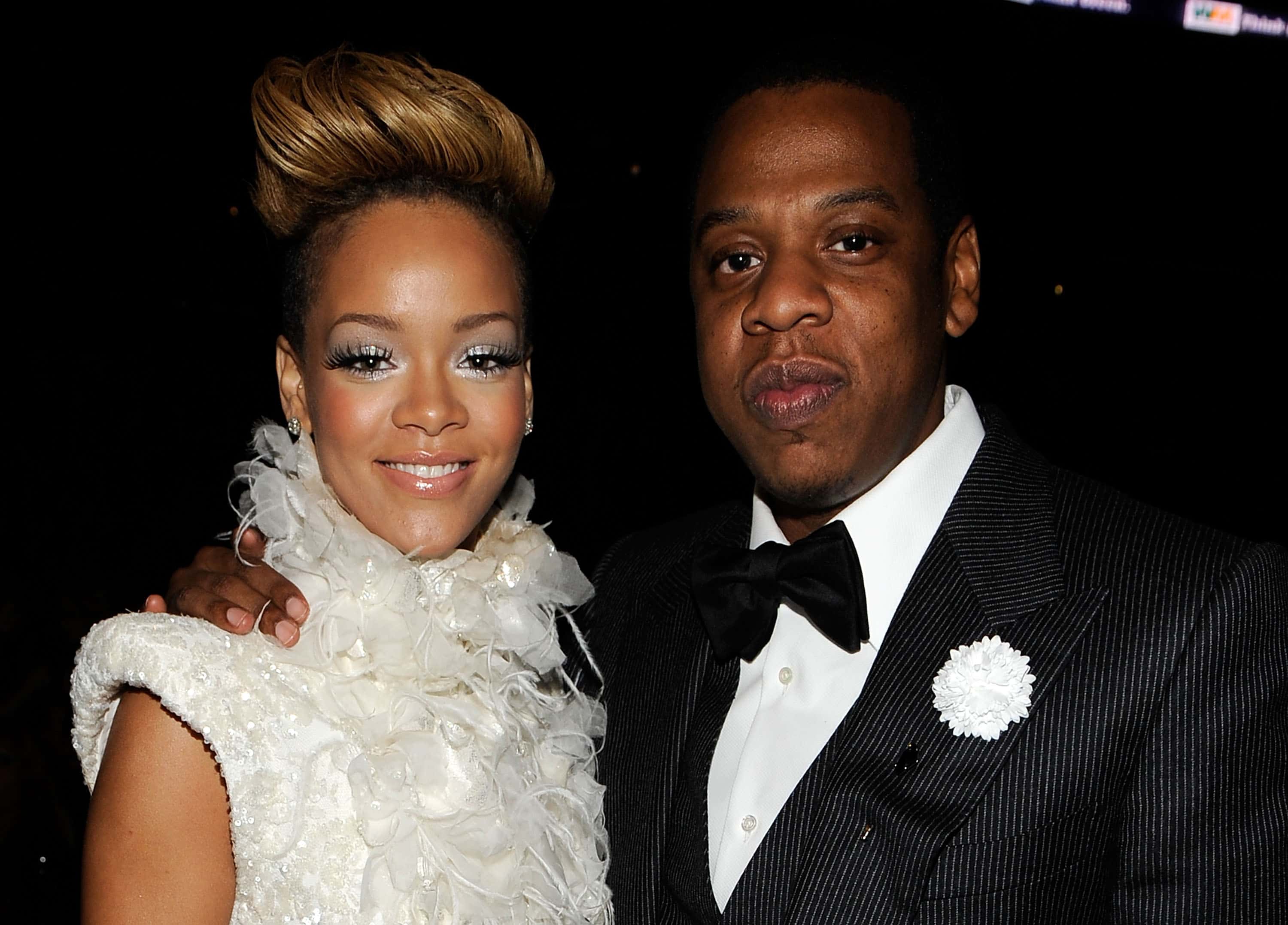 GettyImages-96307474 Singer Rihanna (L) and Jay-Z