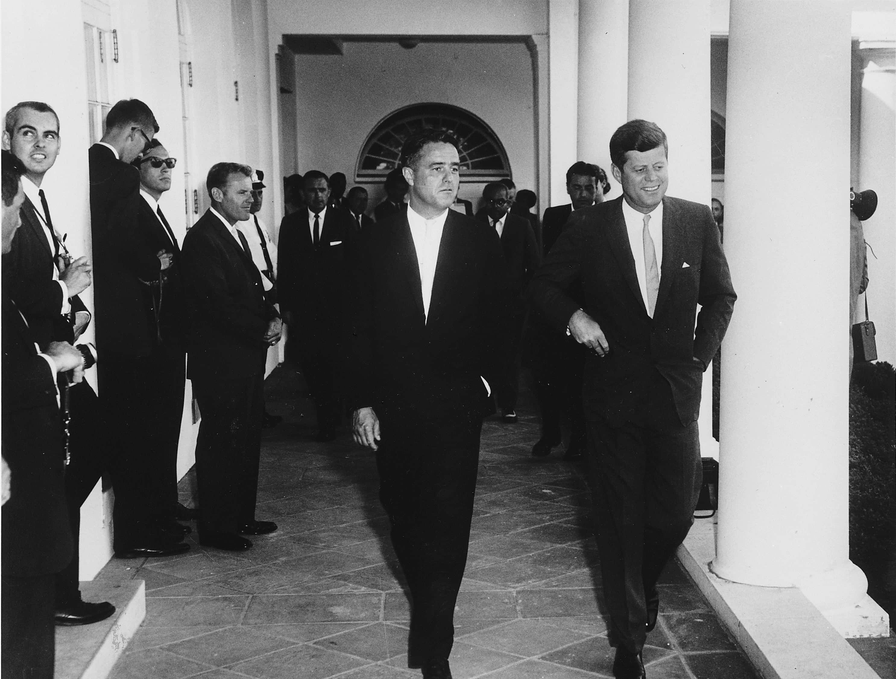 President John F. Kennedy in a black suit