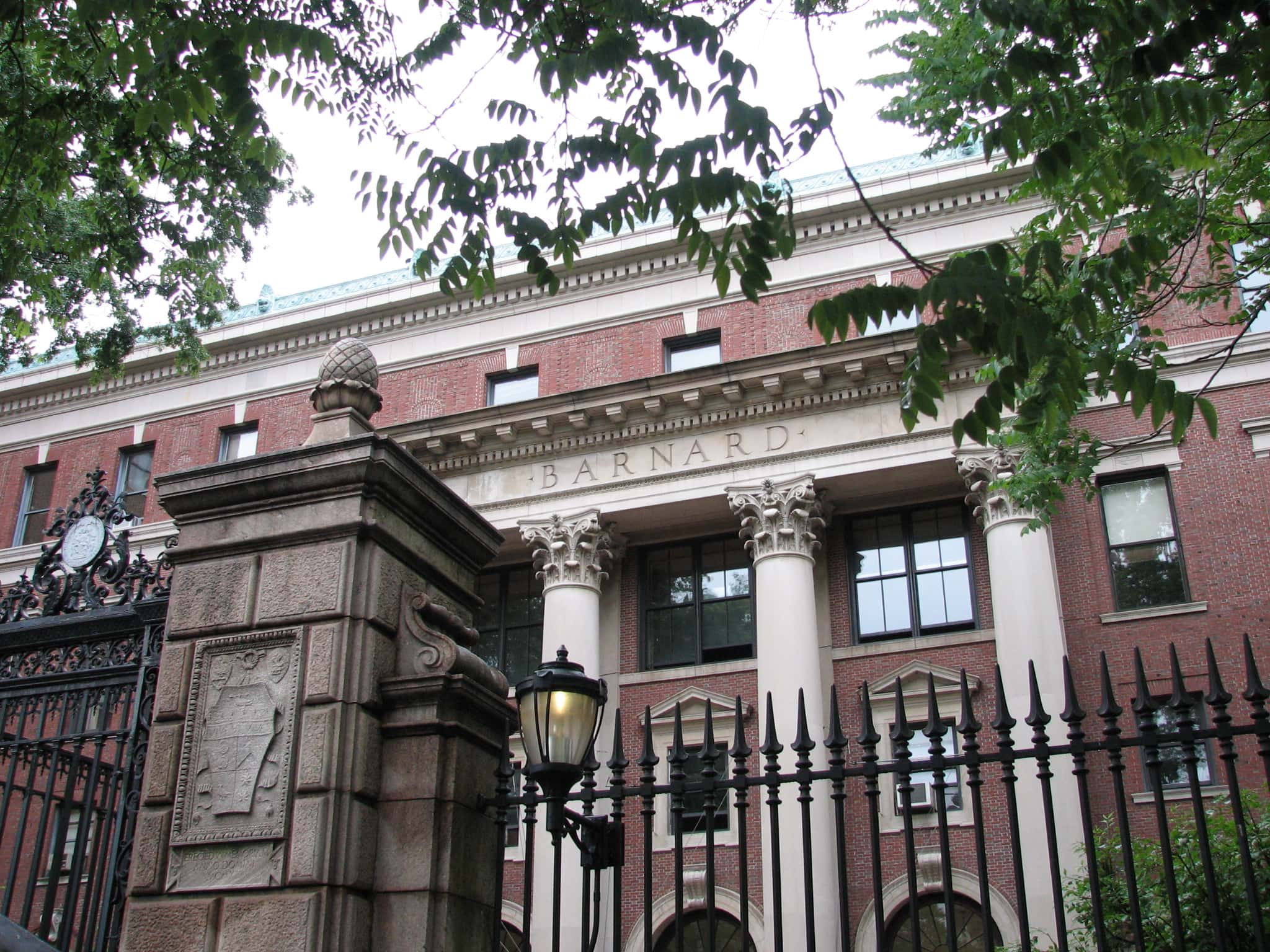 A grand entrance to Barnard College, adorned with classical architecture.