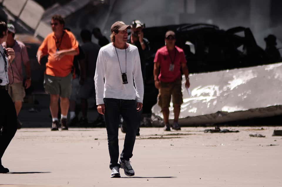 Michael Bay walking on set