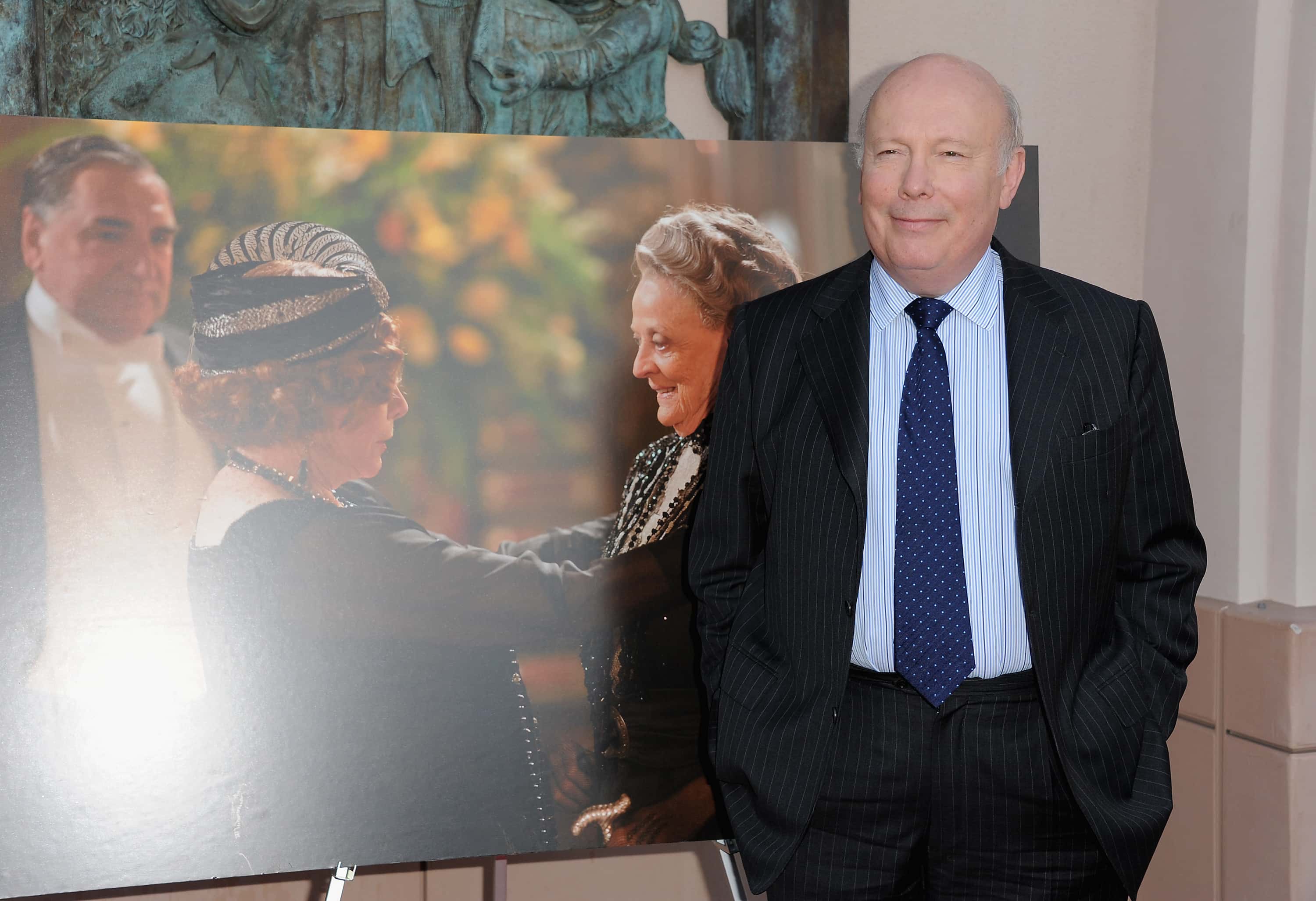 Creator Julian Fellowes arrives at an evening with