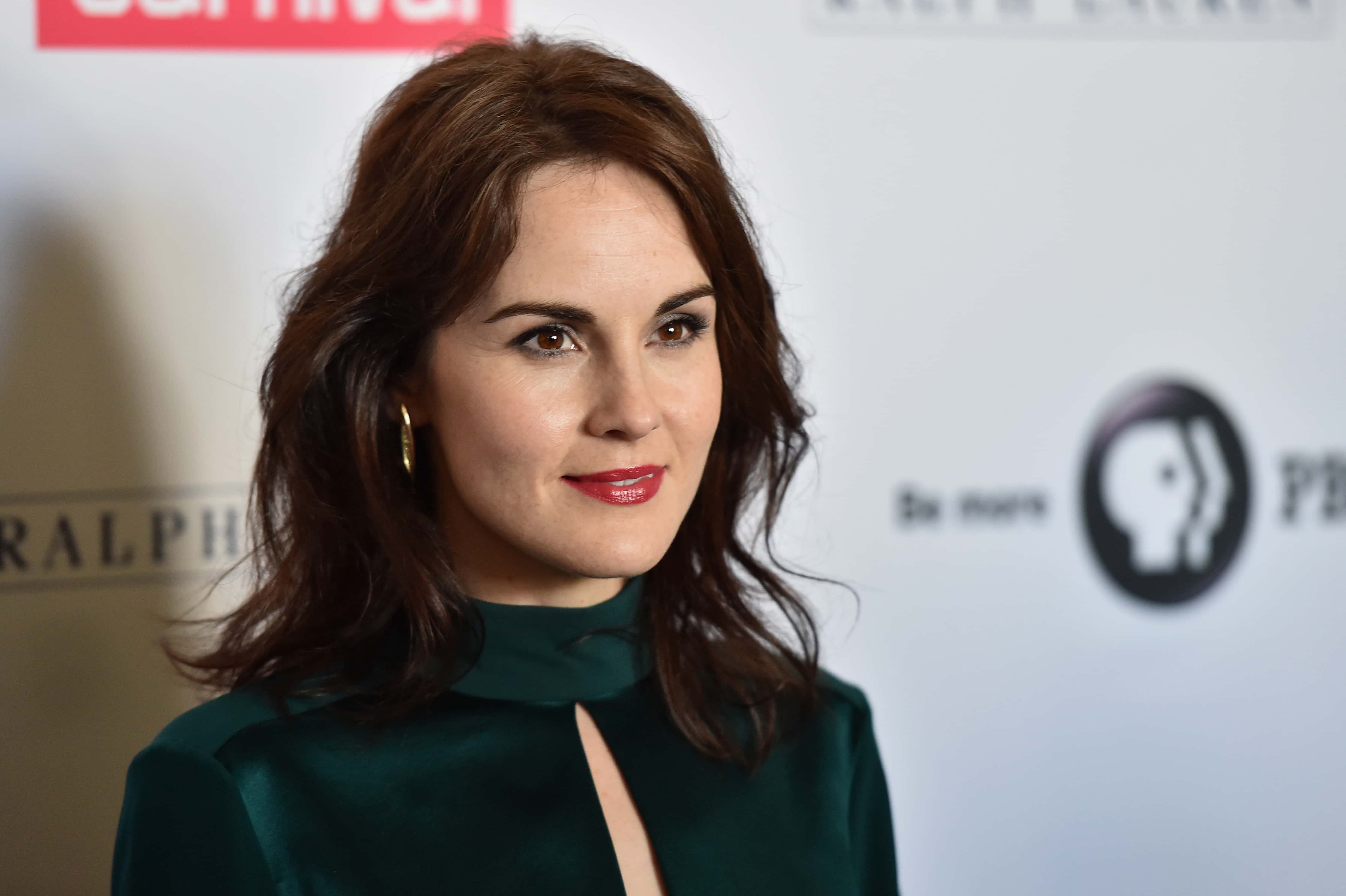 Actress Michelle Dockery attends the 'Downton Abbey' cast photo call in green top
