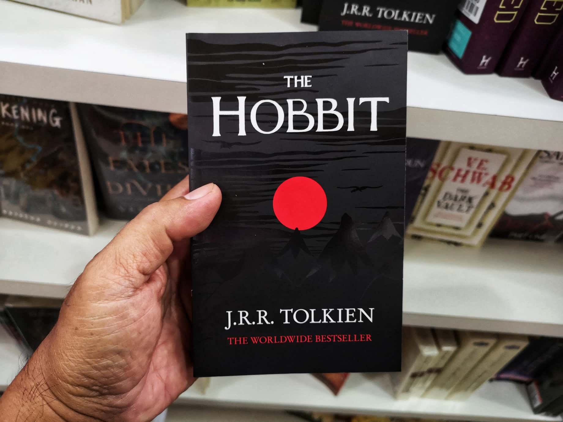 Person holding a book