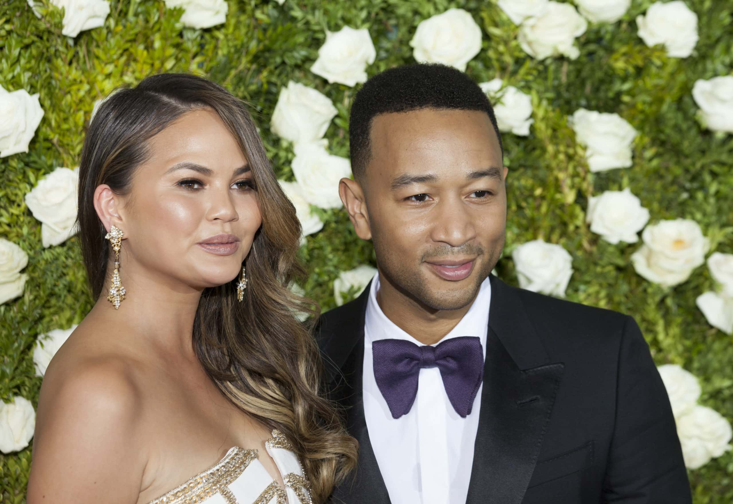 Chrissy Teigen in Pamella Roland and John Legend attend Tony awards 2017