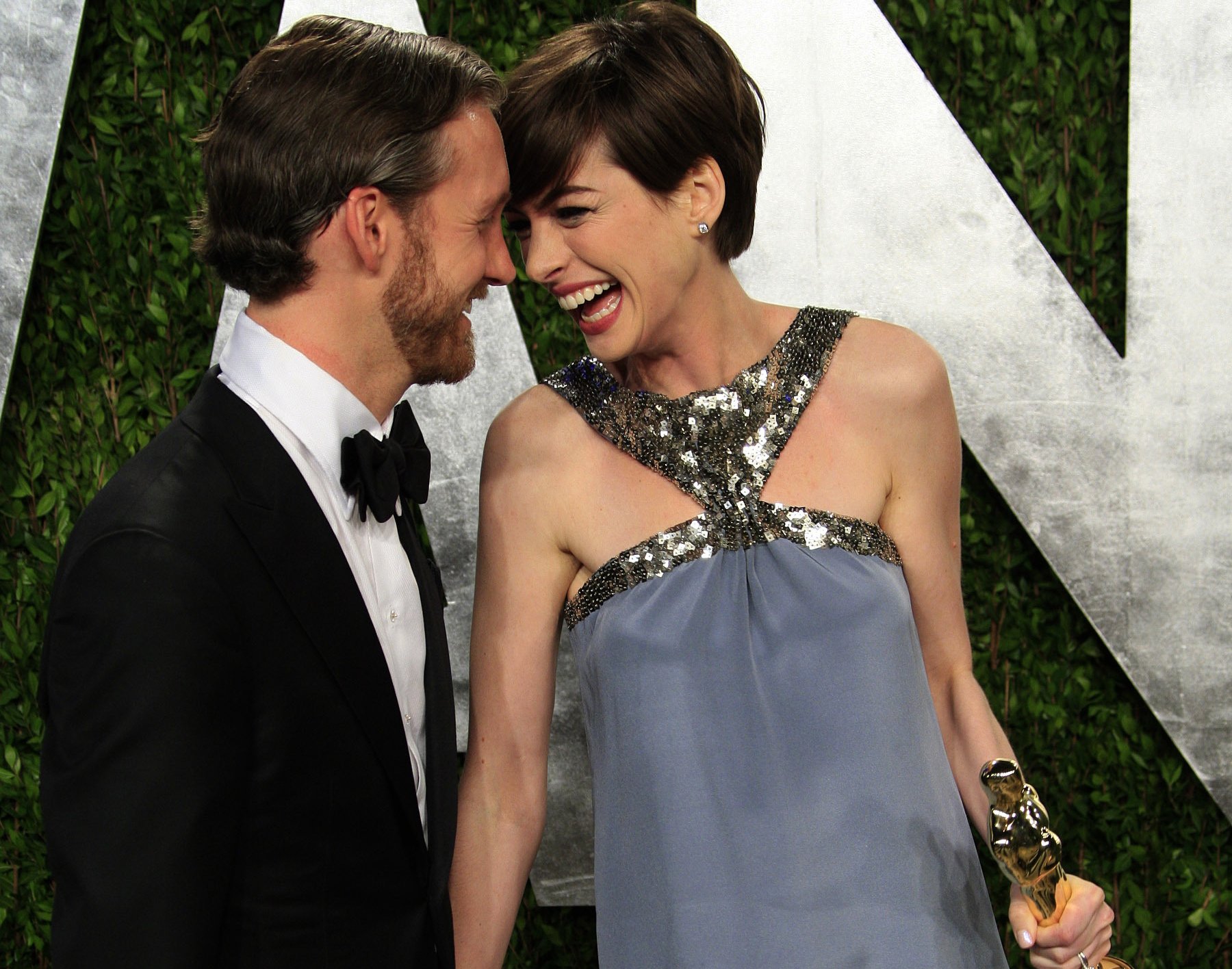 Adam Shulman, Anne Hathaway at the Vanity Fair Oscar Party