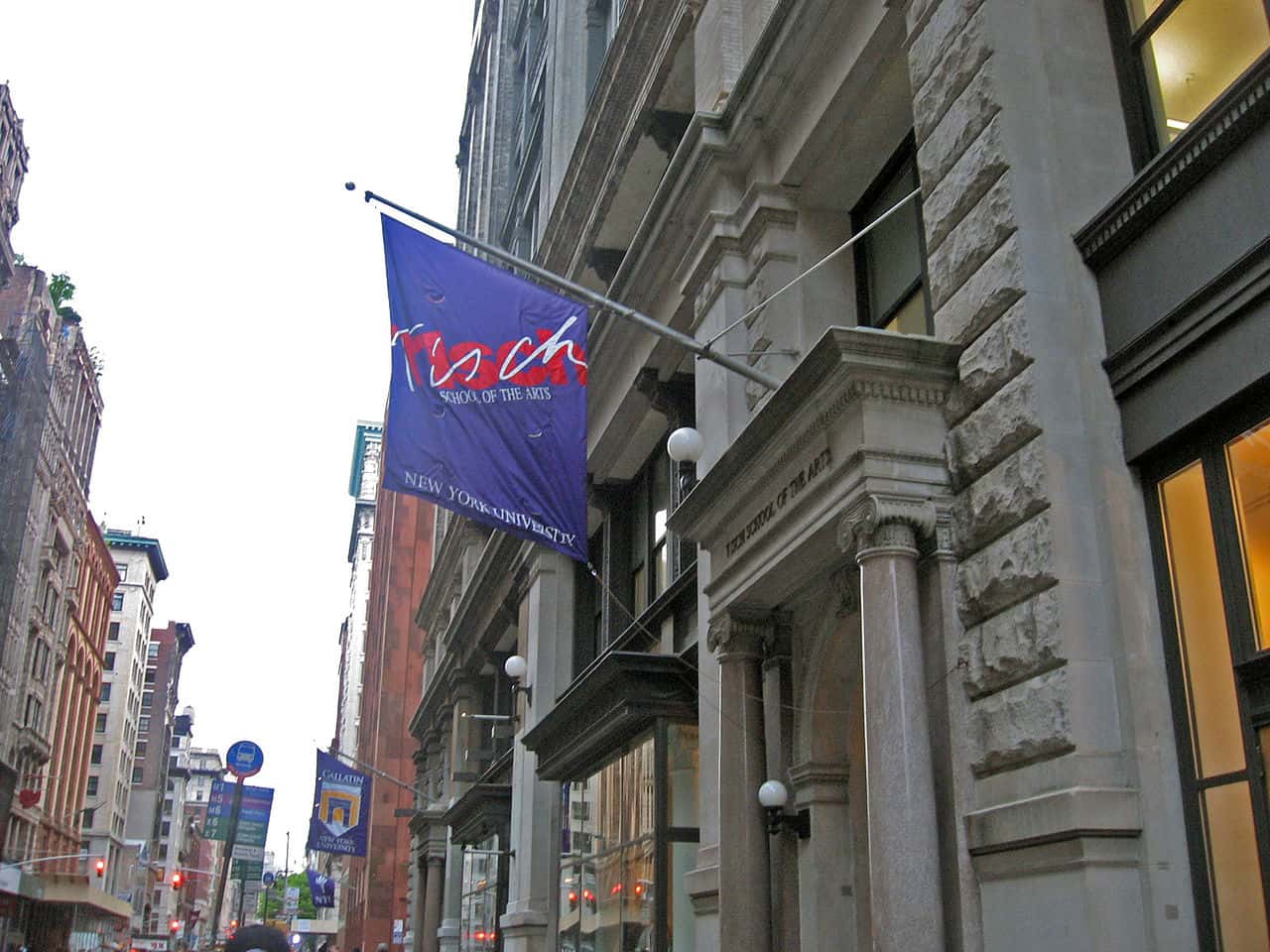 The image showcases a portion of the Tisch School of the Arts building, part of New York University.