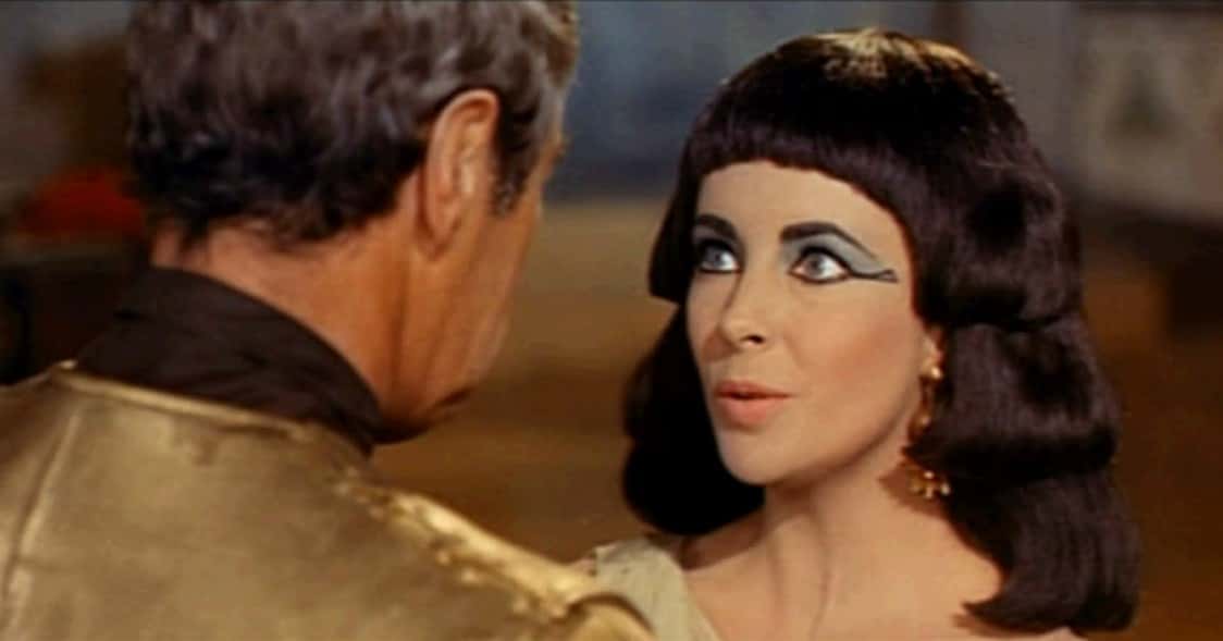 Screenshot of Rex Harrison and Elizabeth Taylor from the trailer for the film Cleopatra. - 1963