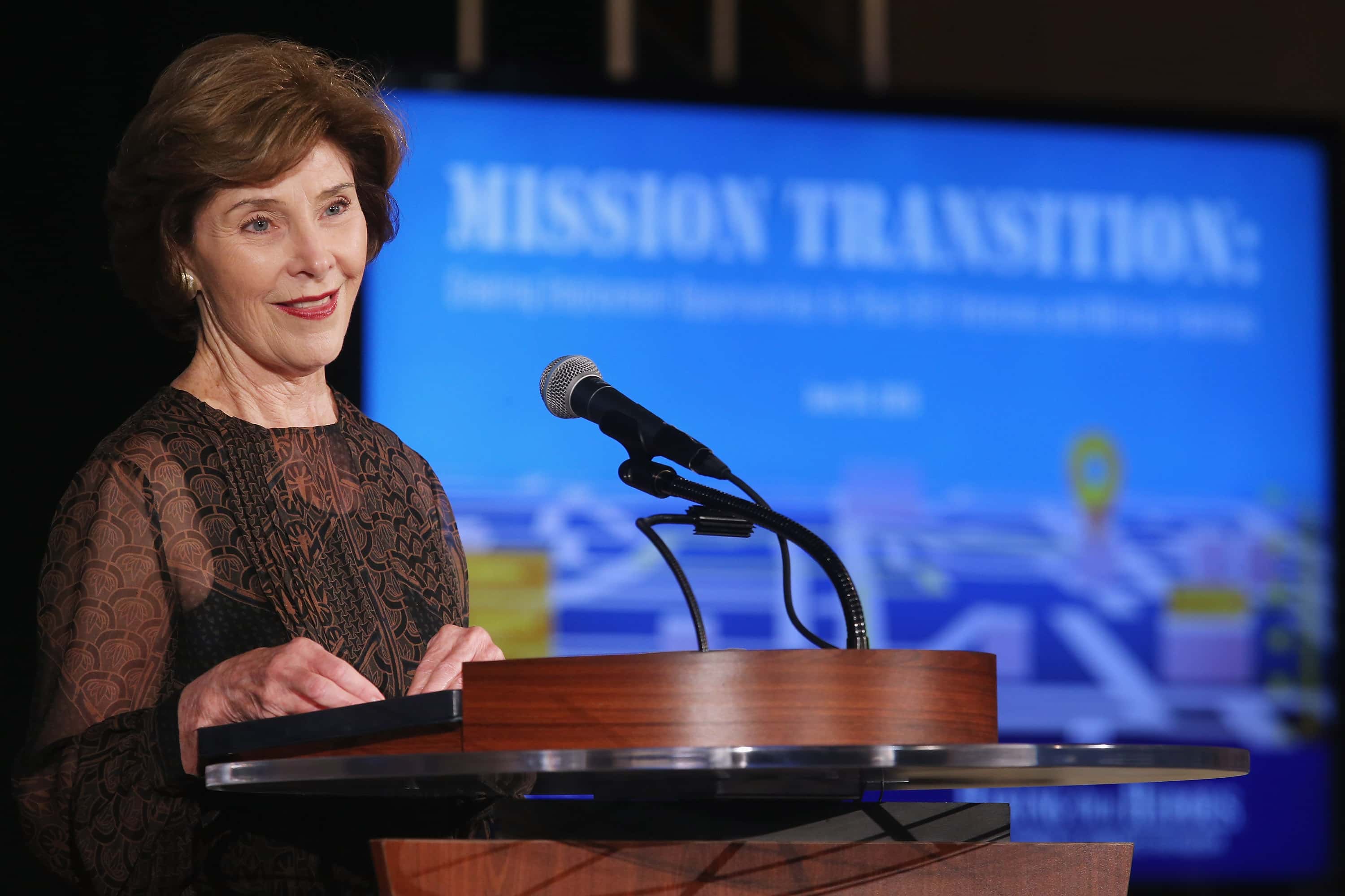 Former first lady Laura Bush addresses a summit on 'creating employment opportunities for post-9/11 veterans and military families'