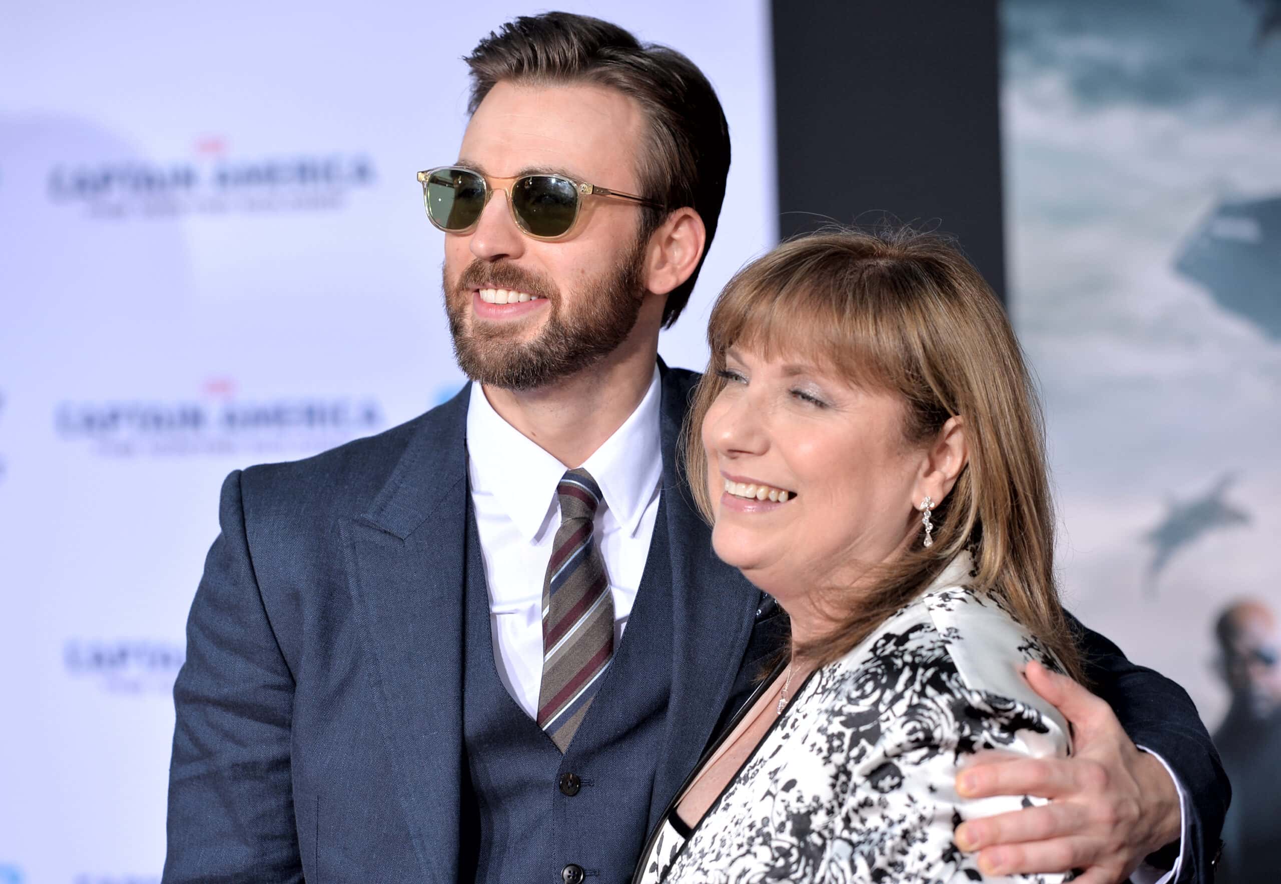 Actor Chris Evans (L) and Lisa Evans attend Marvel's "Captain America: The Winter Soldier" premiere