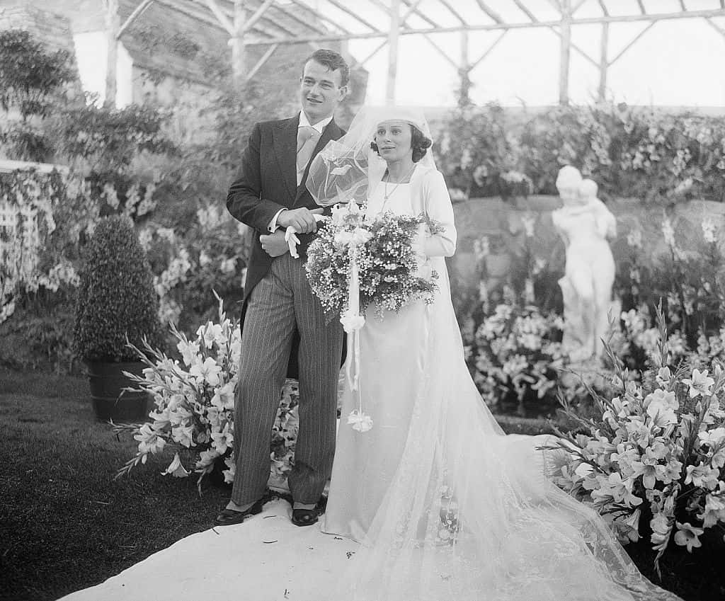 John Wayne, motion picture actor, and his bride, the former Miss Josephine Saenz