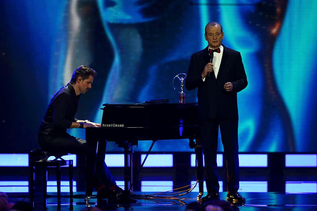 Host Bill Murray sings on stage during the 2016 Laureus World Sports Awards