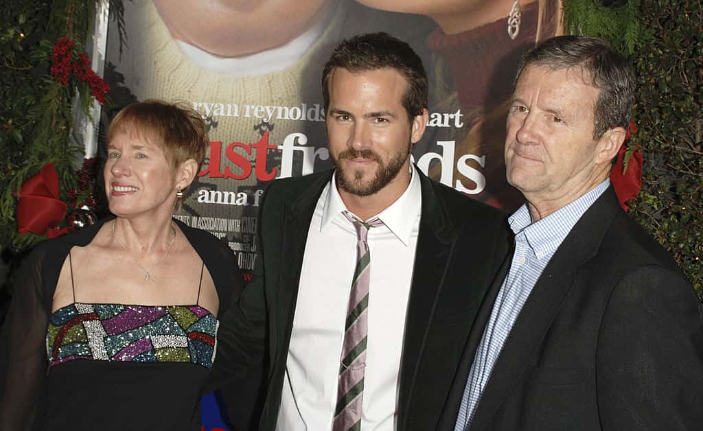 Actor Ryan Reynolds (center) and his parents attend the premiere of New Line's 