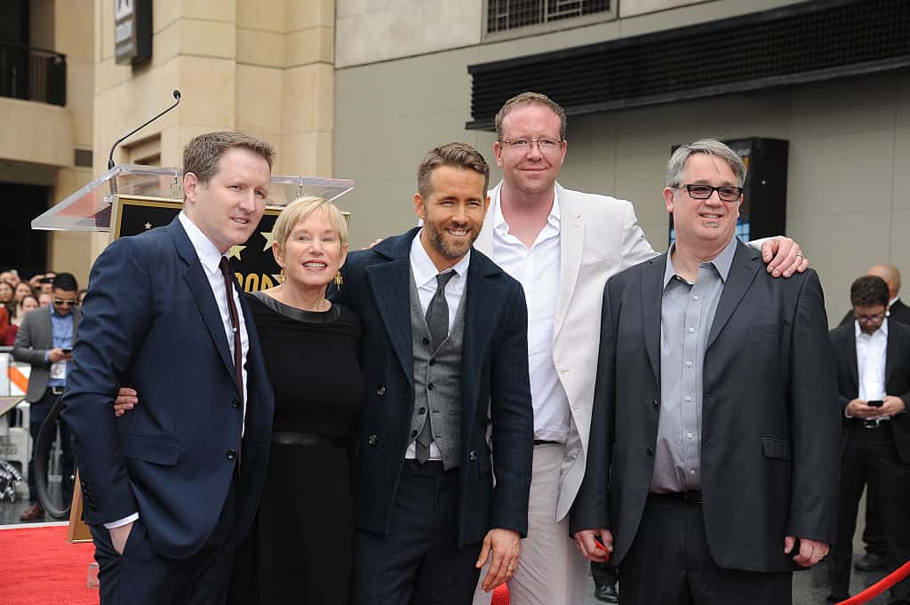 Actor Ryan Reynolds and brothers pose for a photo as Reynolds is honored with a star on the Hollywood Walk of Fame