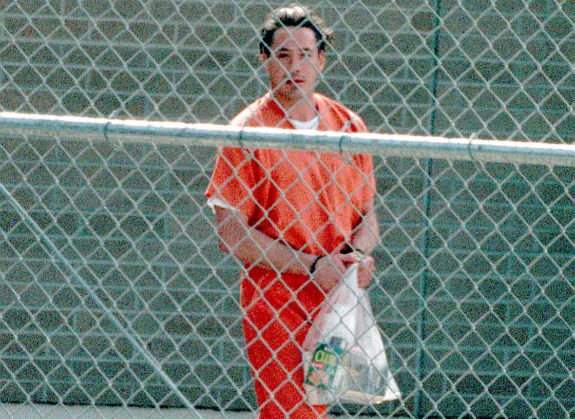 Actor Robert Downey, Jr. on his way to a prison bus after his hearing August 5, 1999 in Malibu, California