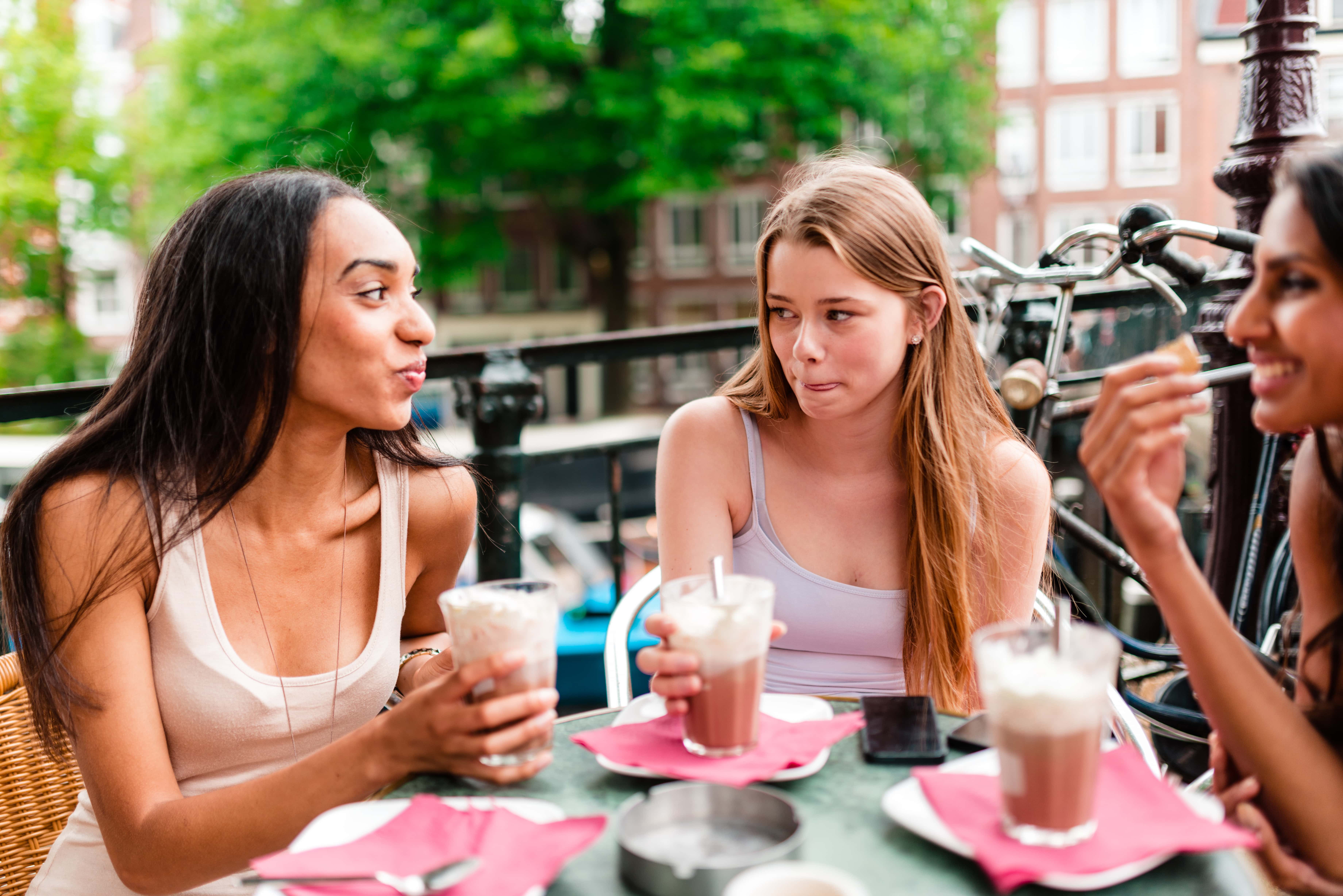 Friends Dinking Coffee in Amsterdam.