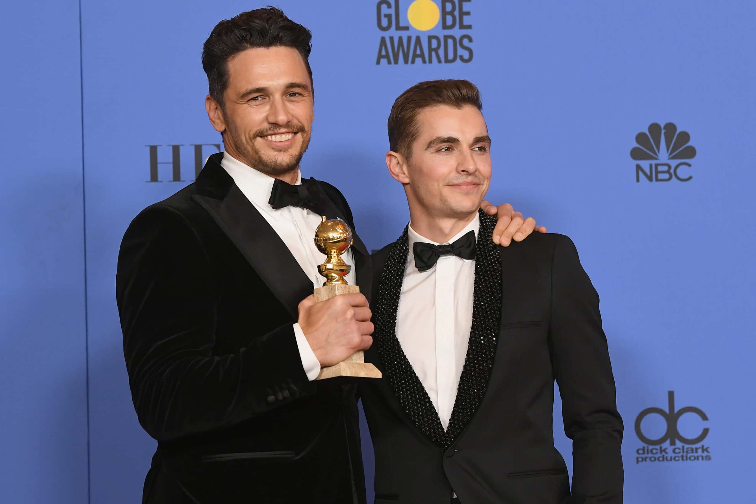 Dave Franco (R) poses with James Franco during The 75th Annual Golden Globe Awards