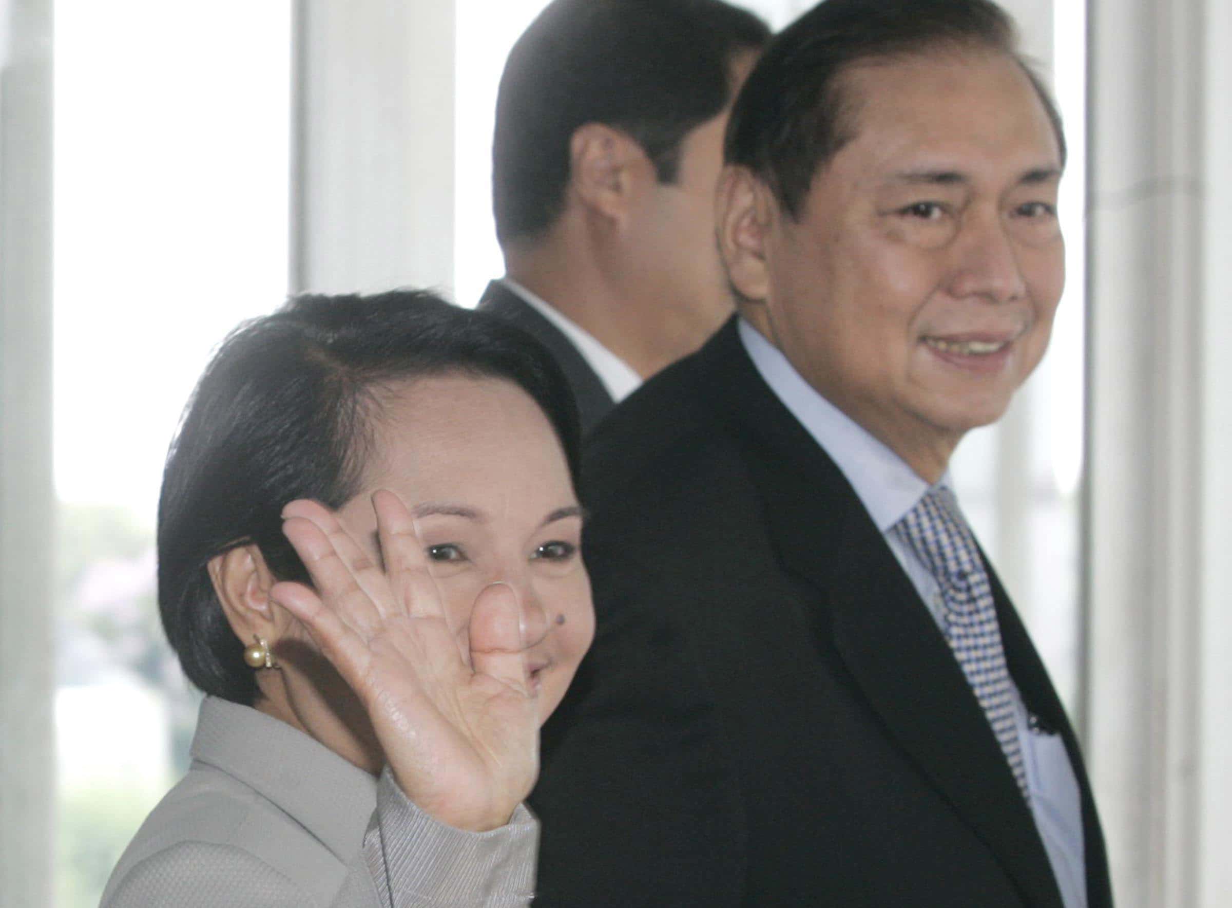 President Gloria Macapagal-Arroyo, accompanied by First Gentleman Atty