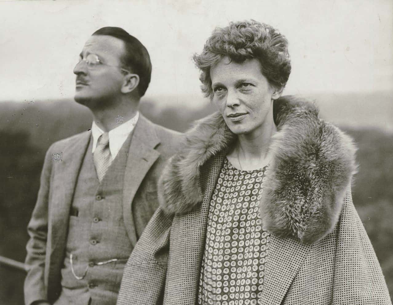 Putnam and Amelia Earhart looking away from the camera