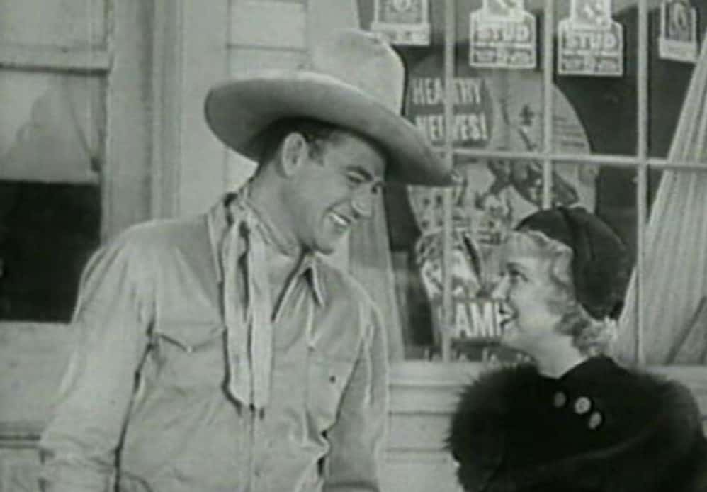 Screenshot of John Wayne and Verna Hillie from the movie The Star Packer