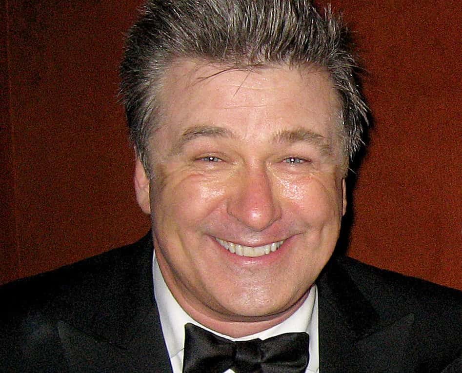 Alec Baldwin wearing a suit