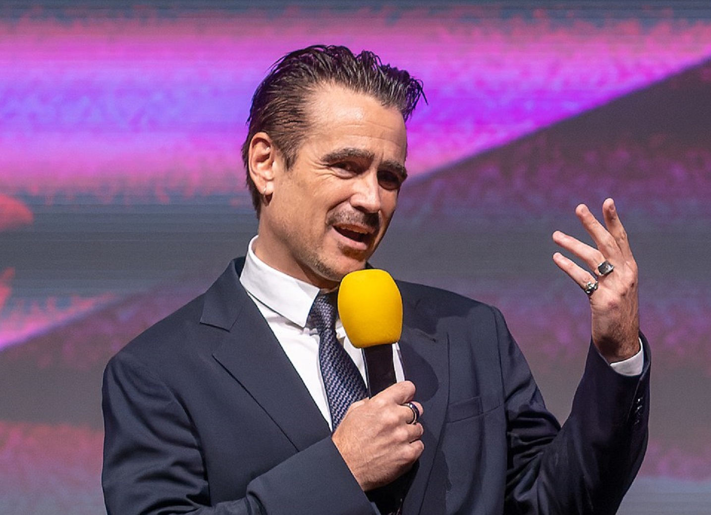 Colin Farell speaking at an event