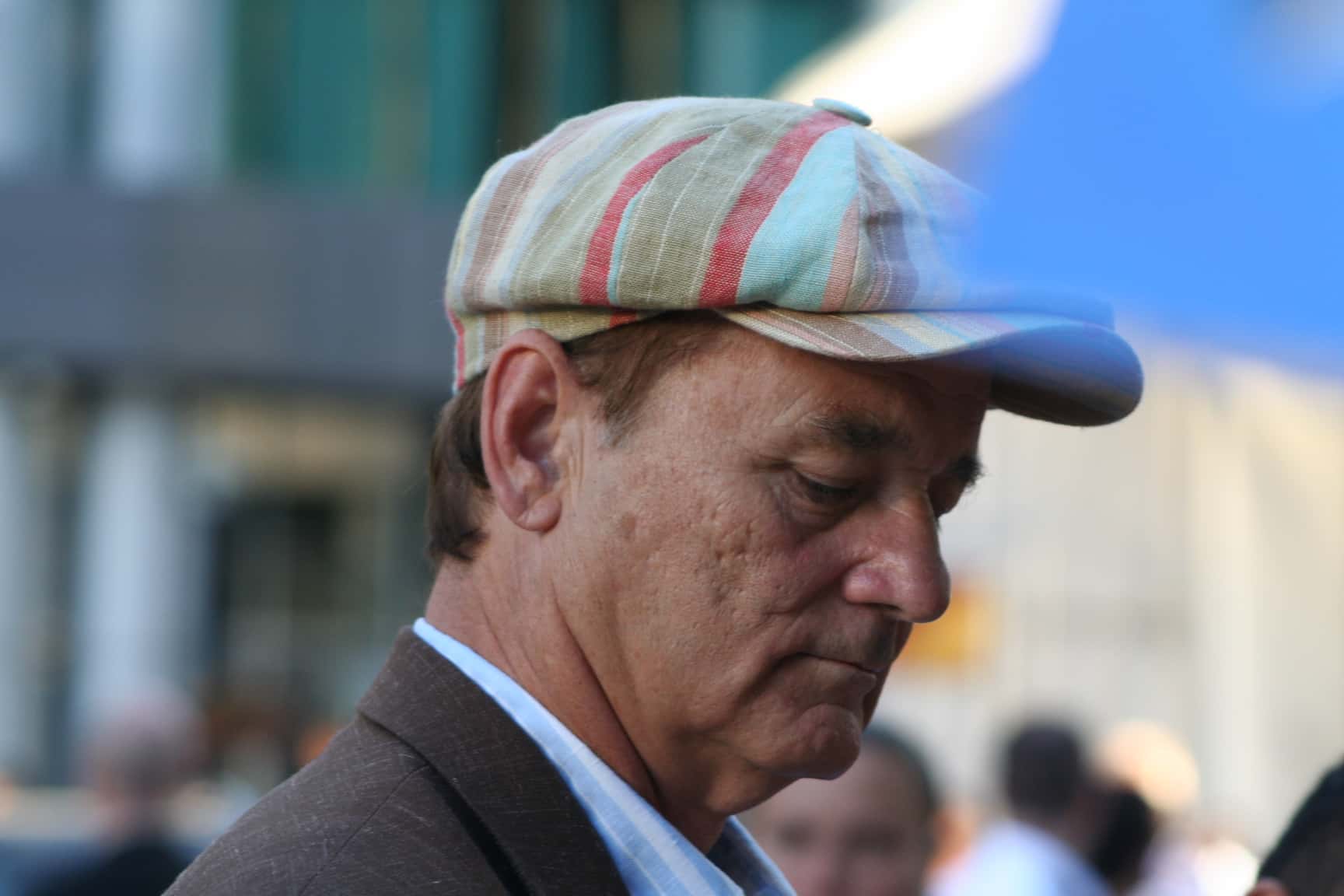 Portrait Photo of Bill Murray wearing a brown suit and a hat