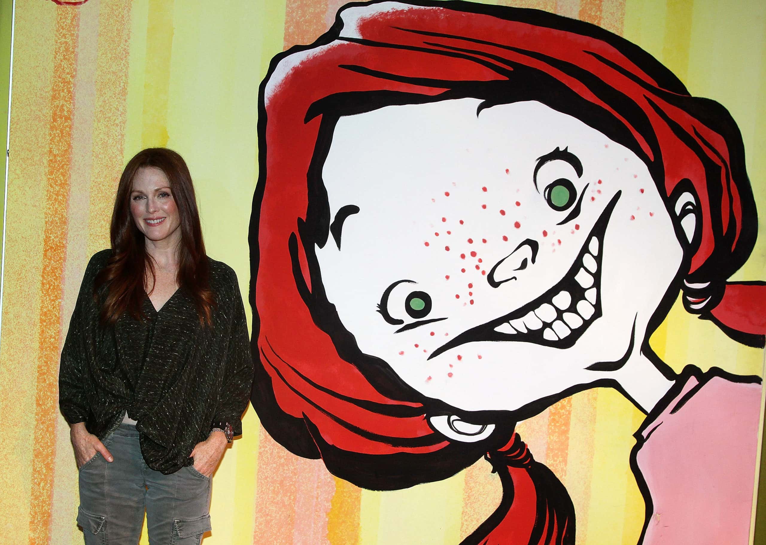 Julianne Moore poses at the "Freckleface Strawberry The Musical" photocall
