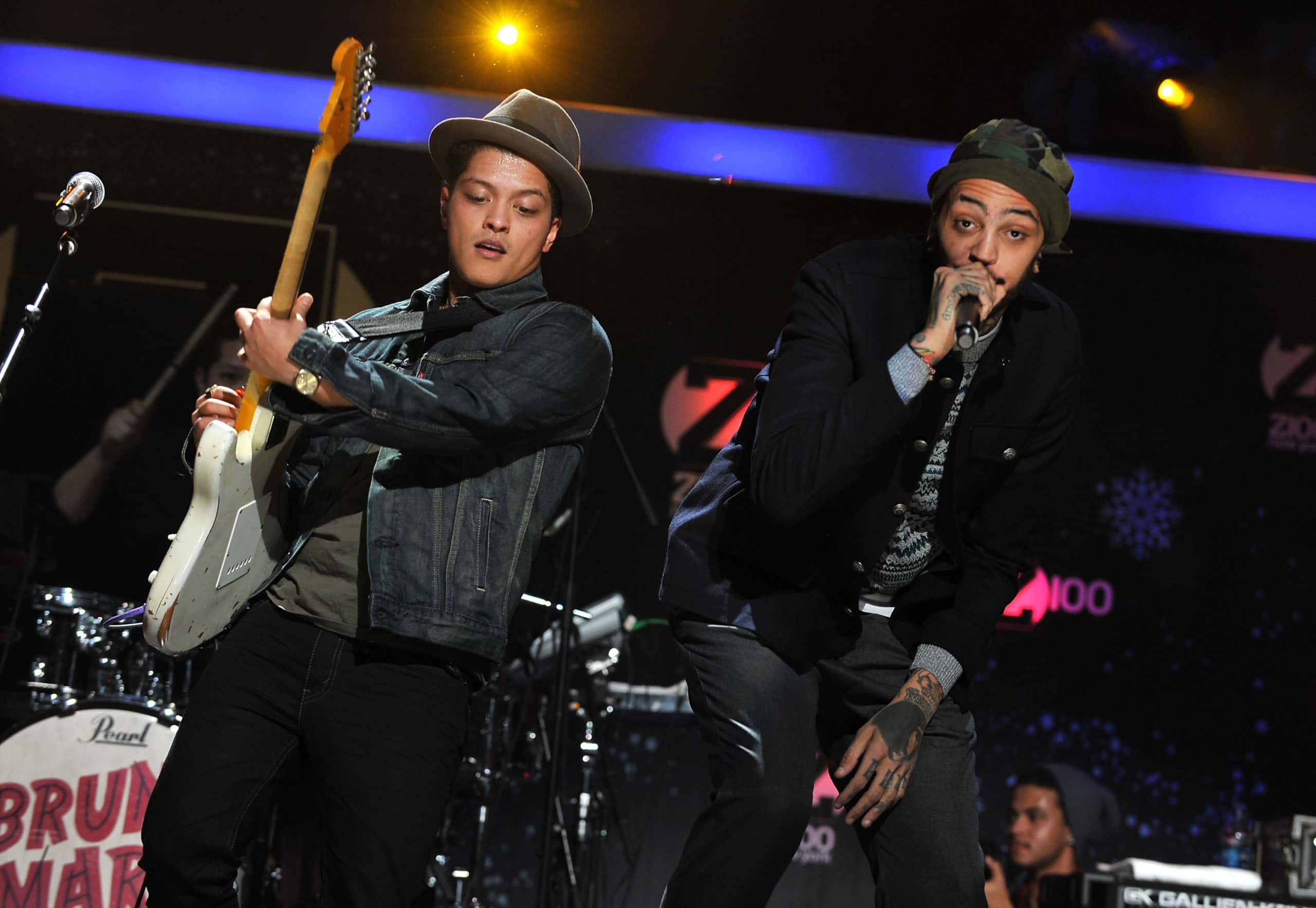Bruno Mars and Travie McCoy perform onstage during Z100's Jingle Ball 2010