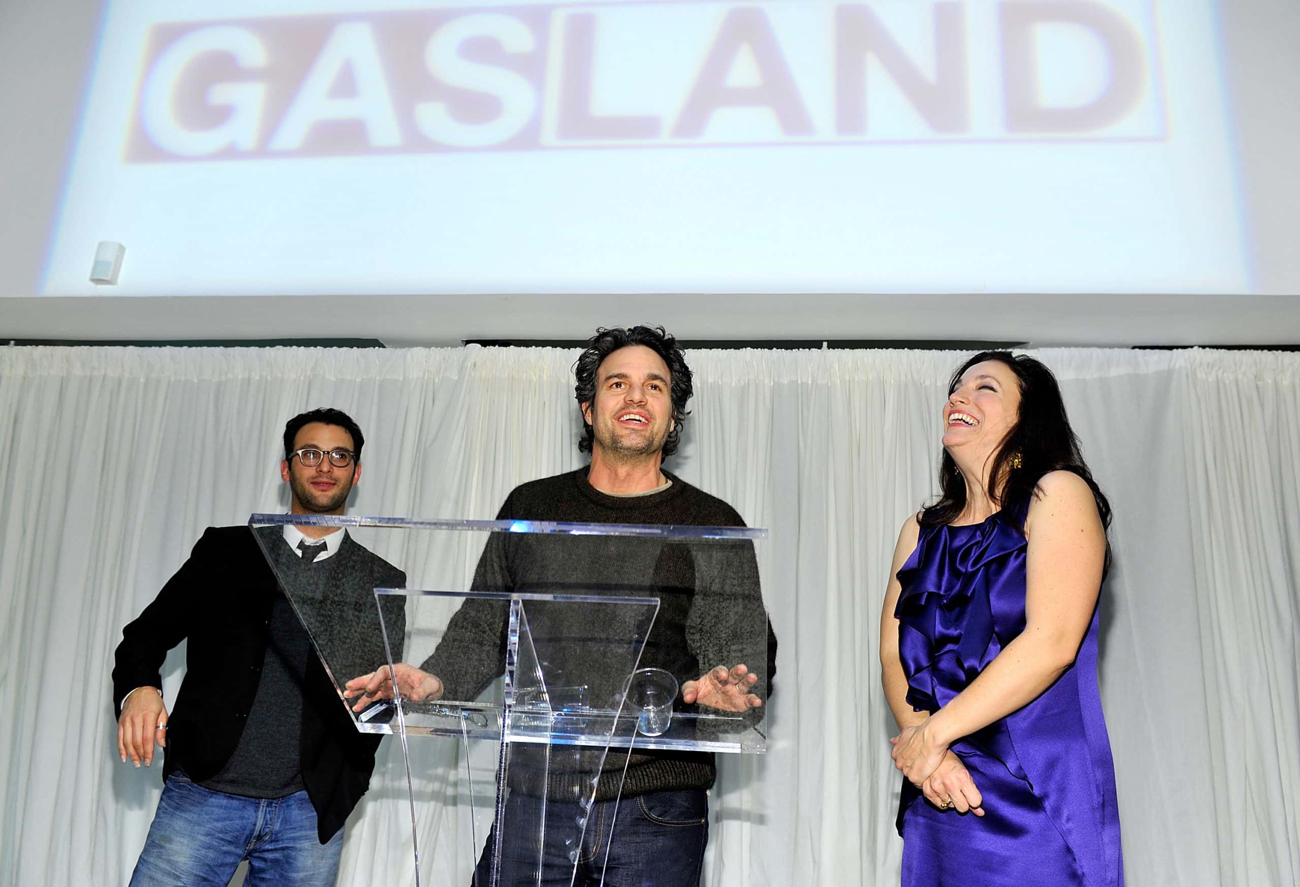 Josh Fox, Mark Ruffalo and Trish Adlesic attend the "Gasland" DVD release party