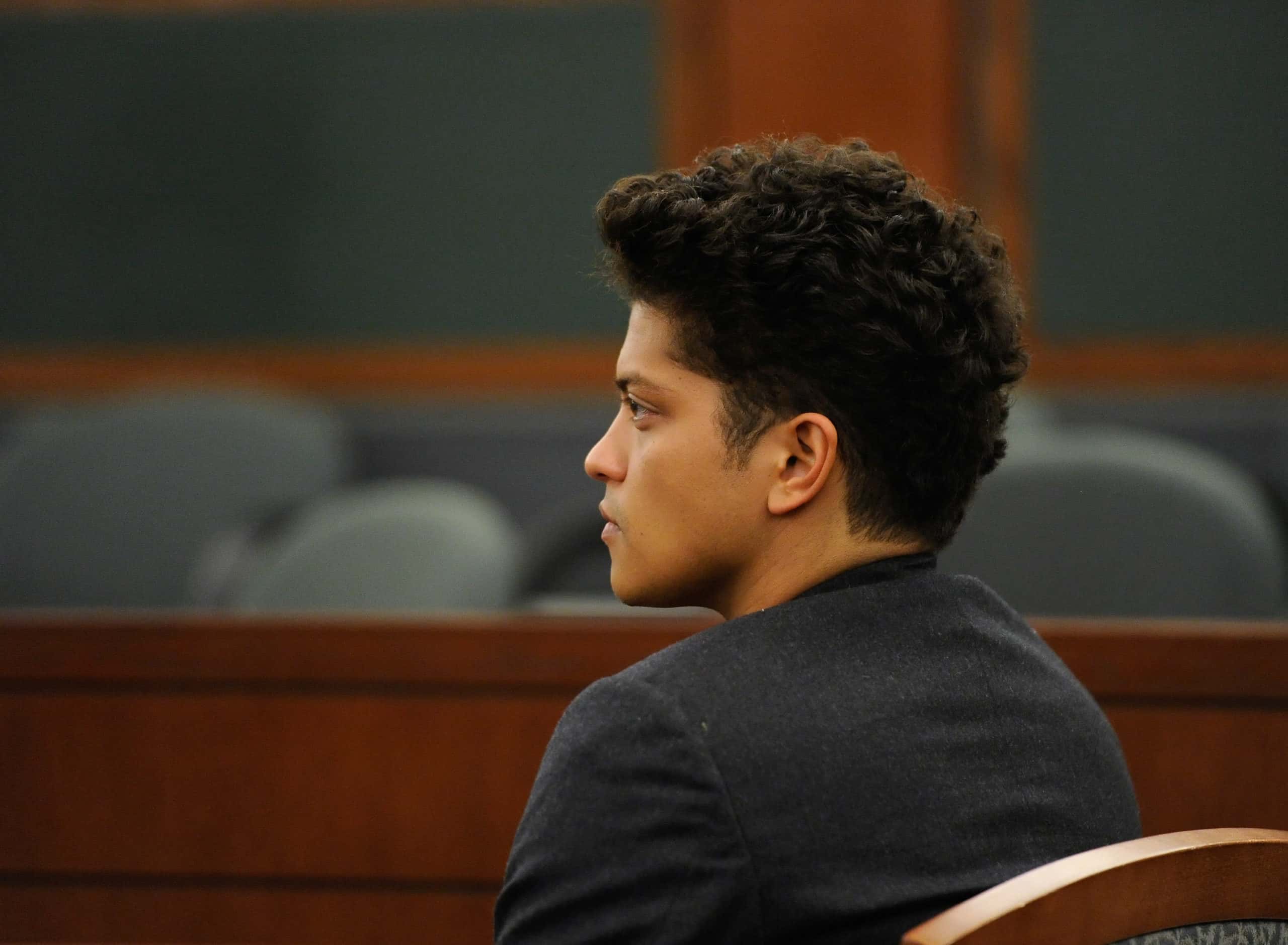 Recording artist Bruno Mars appears at the Clark County Regional Justice Center on a felony drug possession charge February 16, 2011 in Las Vegas, Nevada.
