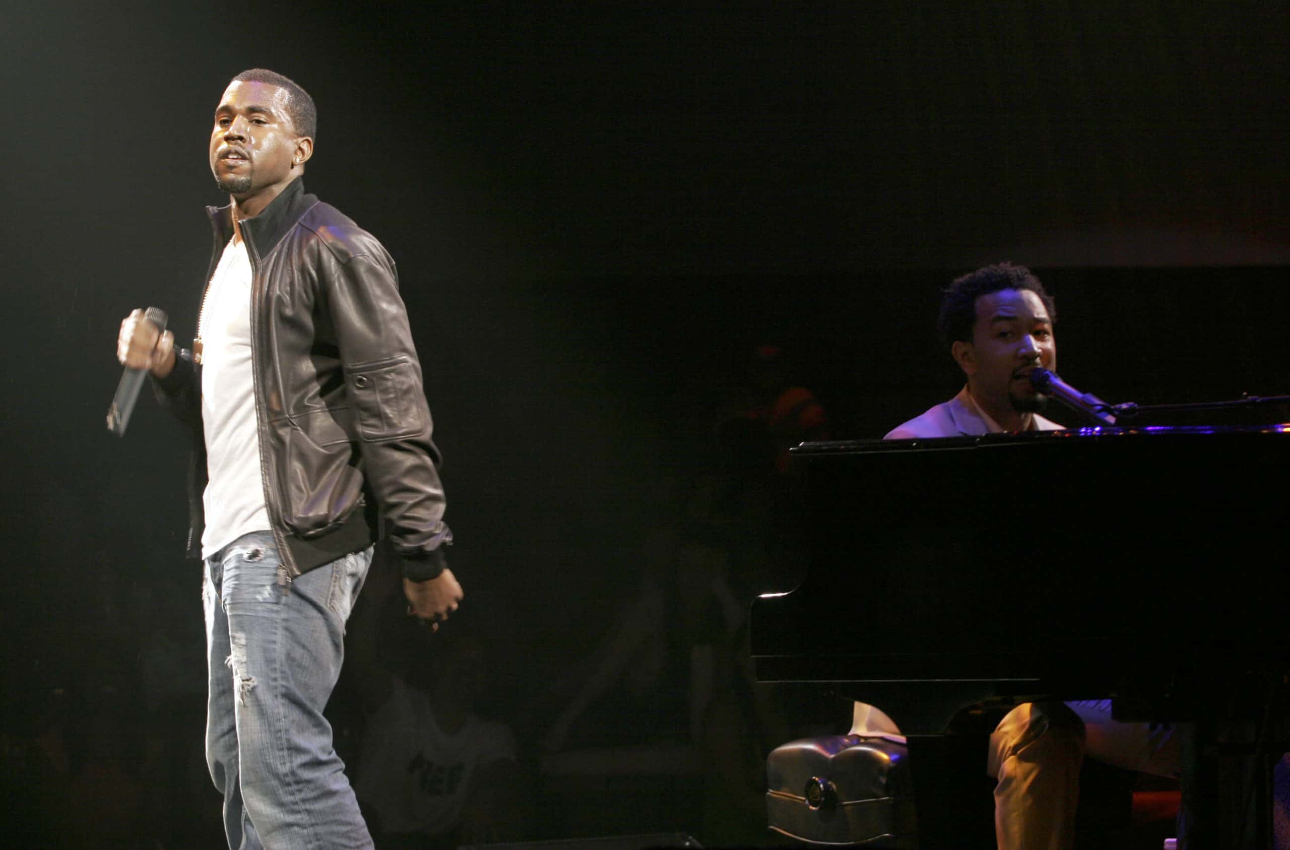 Kanye West and John Legend during H&M Live From Central Park