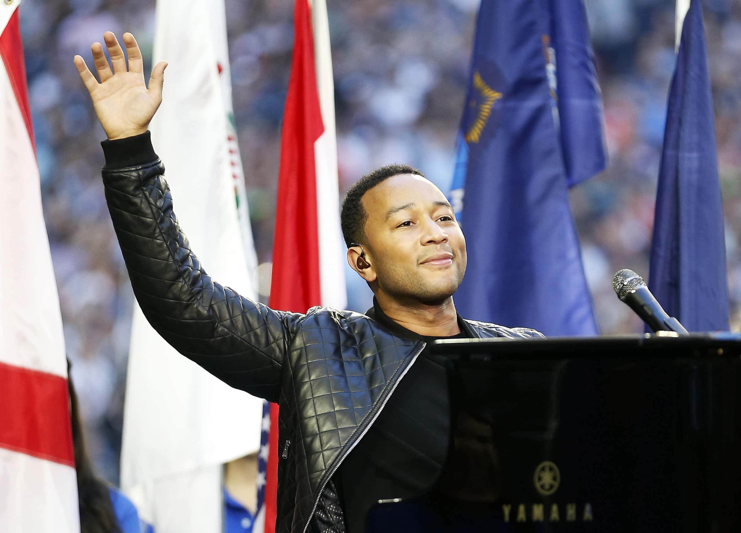 Musician John Legend sings 'America, the Beautiful' prior to Super Bowl XLIX