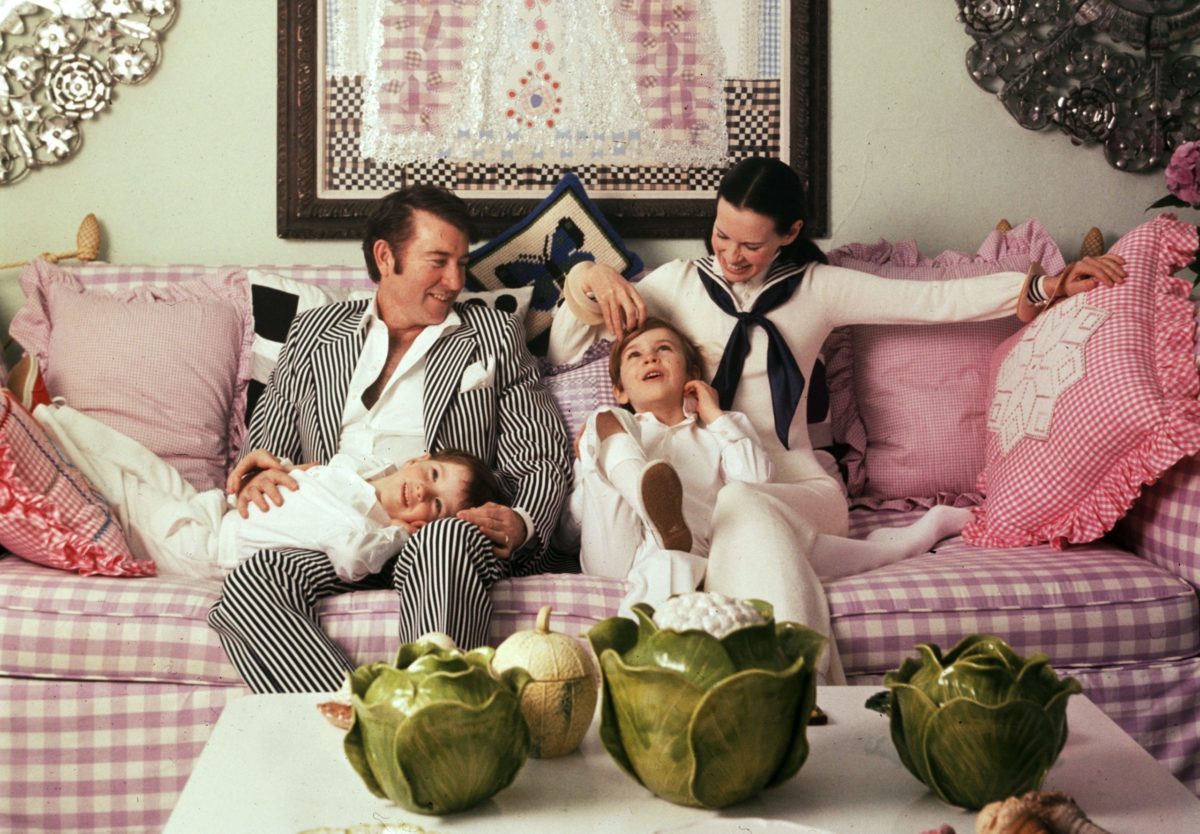 Wyatt Emory Cooper and heiress Gloria Vanderbilt Cooper sit with their sons