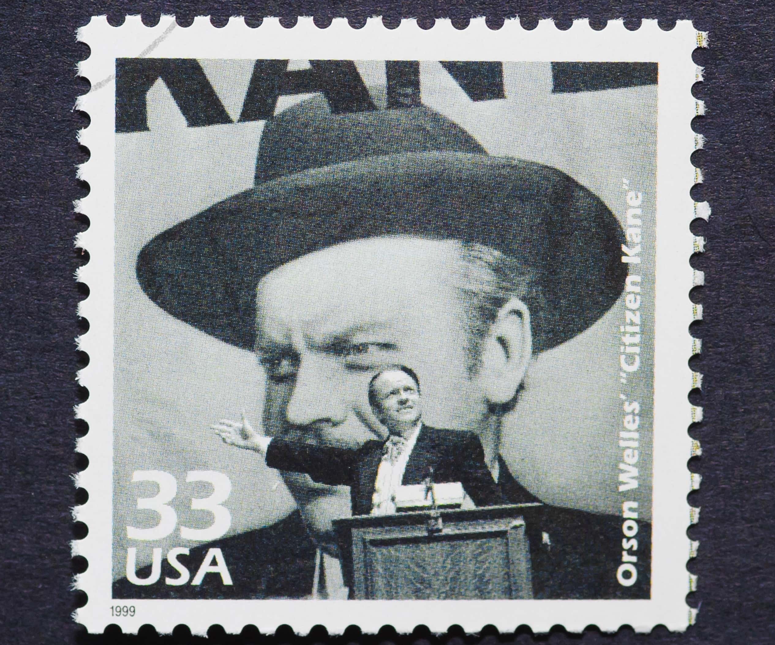 A postage stamp printed in USA showing an image of a Citizen Kane movie