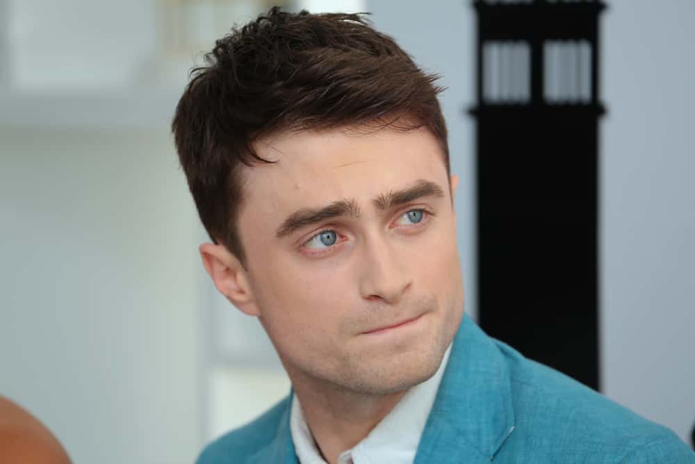 Daniel Radcliffe wearing a turquoise jacket
