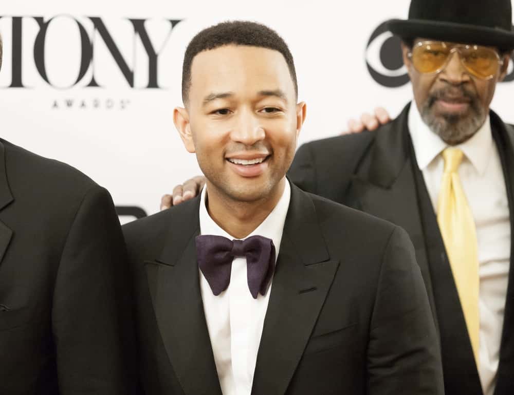 John Legend smiles wide at the 71st Tony Awards Red Carpet