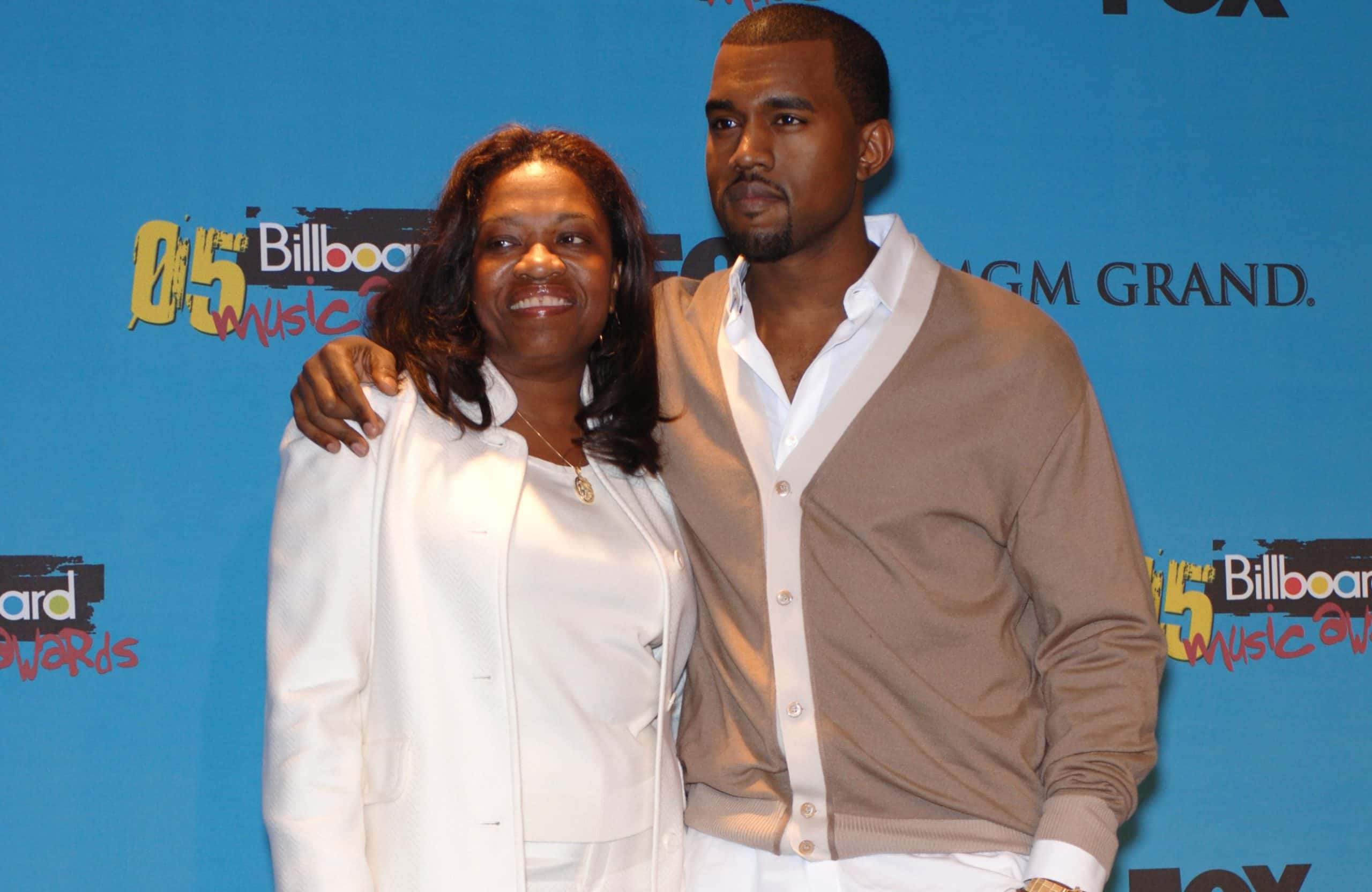 Kanye West and his mother in white and cream outfits