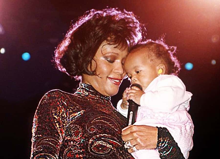 Whitney Houston with her new born, Bobbi-Kristina, sometime during the Bodyguard World Tour in 1993.