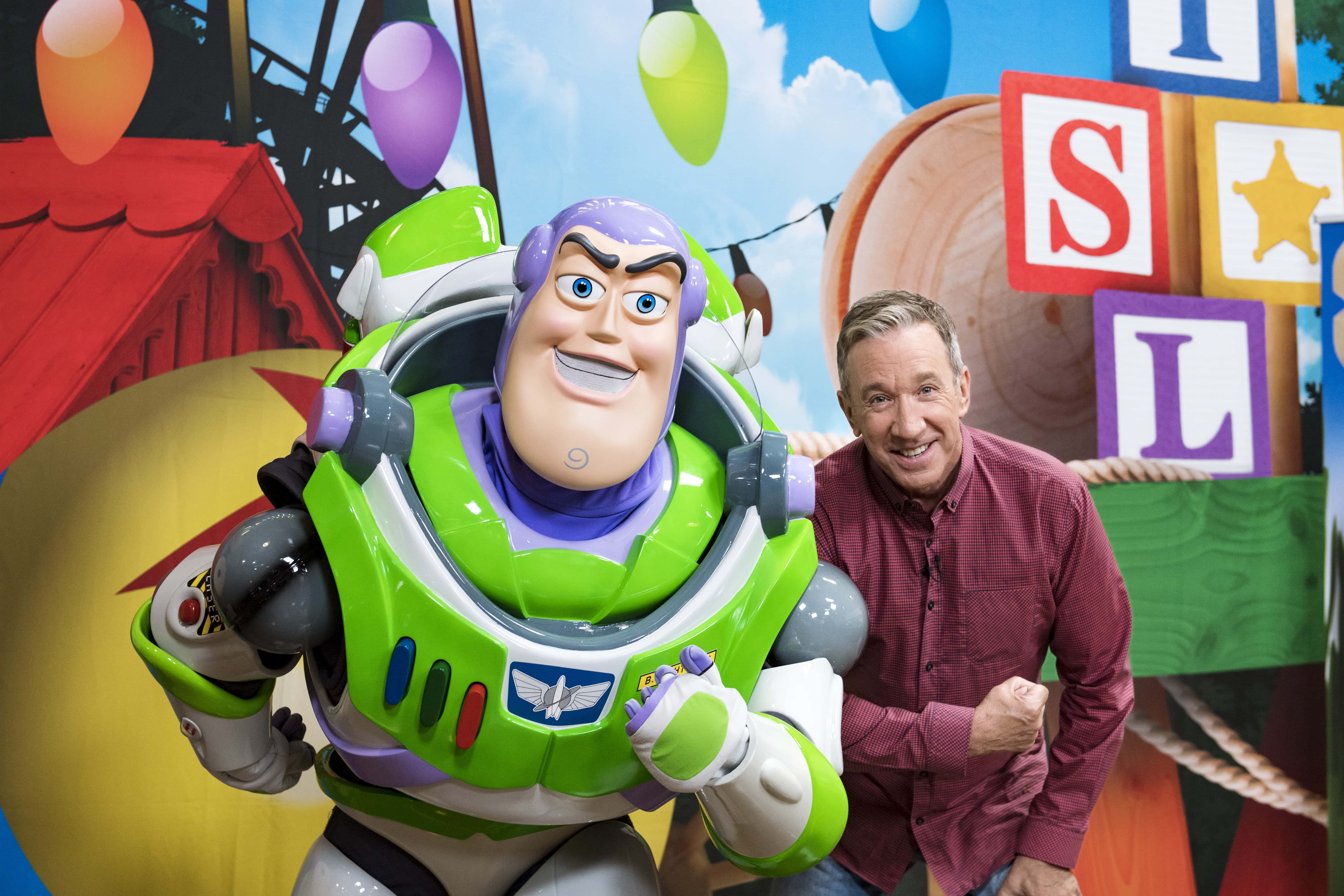 Tim Allen strikes a pose with Buzz Lightyear - 2018